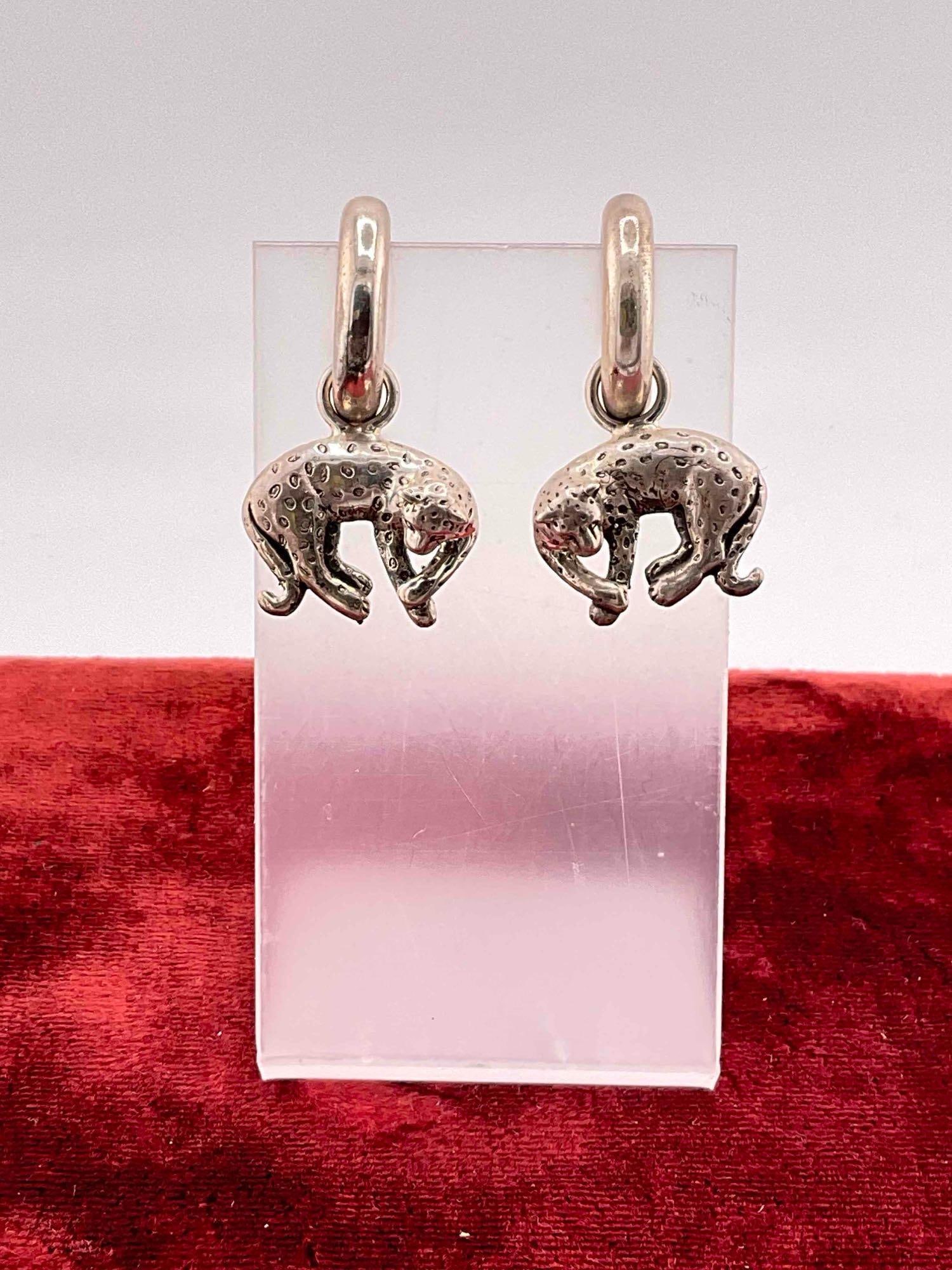 Vintage Carol Felley Sterling Silver Hoop Earrings w/ Leopard Design. See pics.: Vintage Carol Felley Sterling Silver Hoop Earrings w/ Leopard Design. Weighs 16 grams. Stamped 90 on reverse. DM-414