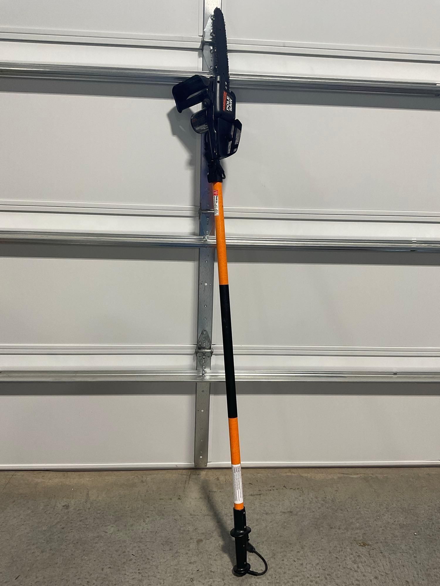 Remington Pole Saw, Electric Chainsaw, model no. RMPS2N1, long pole w/plug on the end: *No shipping due to size* Appears to be in good shape. The piece measures approx 80h x 9w x 6d inches. See pics. E-6040 *No shipping due to size*