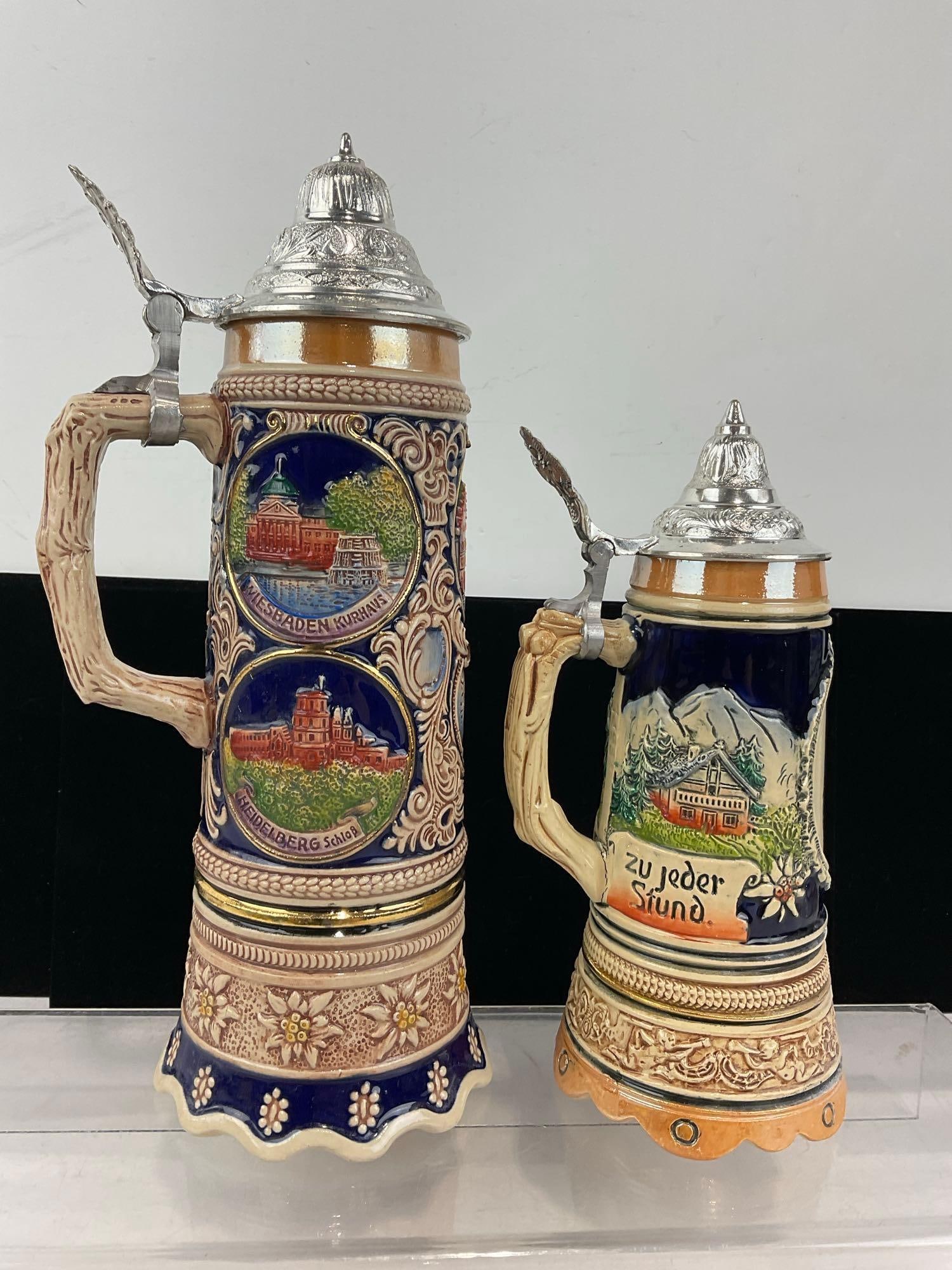 Pair of Musical Box Stoneware Steins, 1x Superstar Switzerland larger w/Frankfurt on front & Munc... - 2