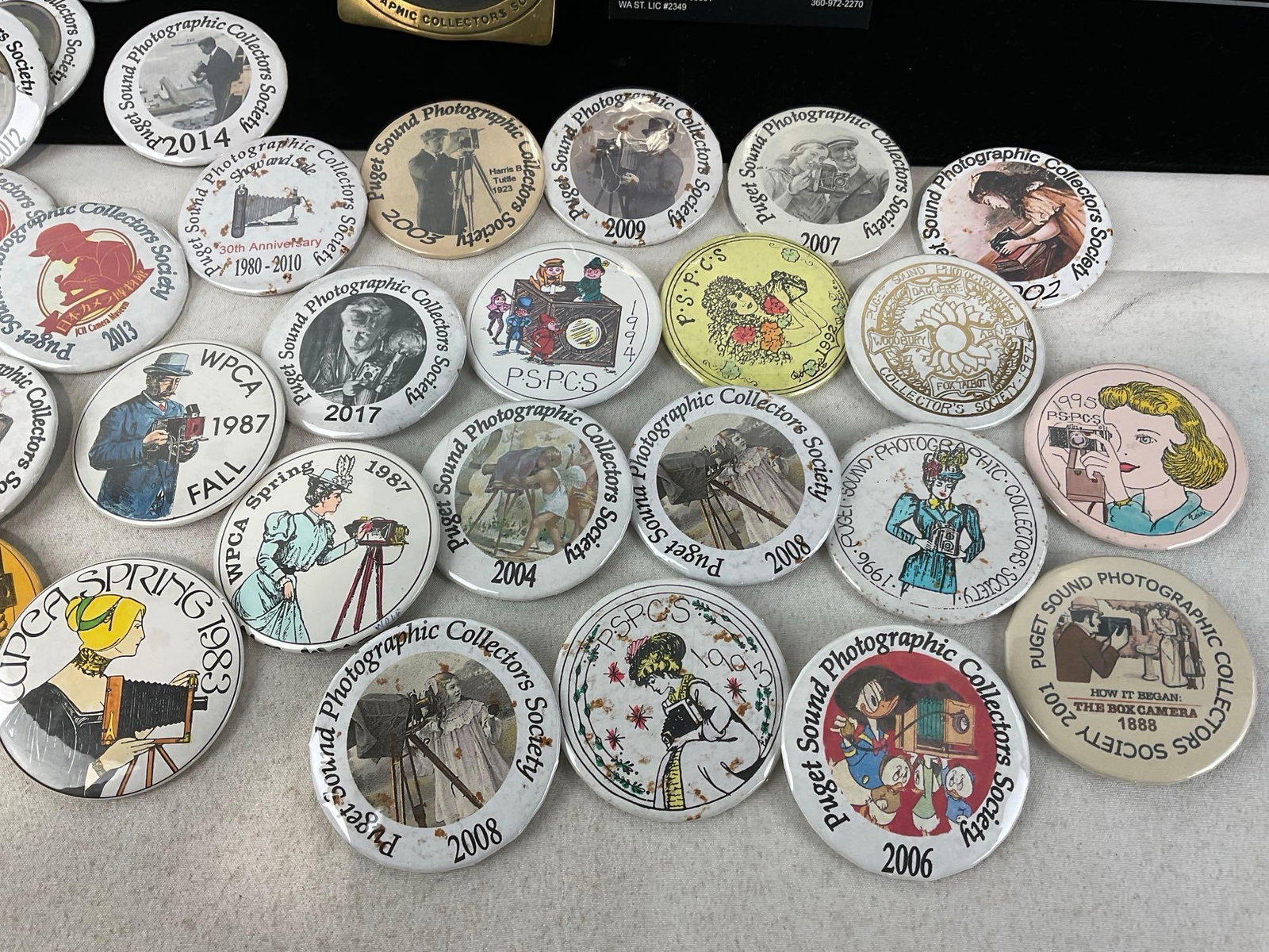Collection of 43 Puget Sound Photographic Collectors Society Buttons, from around 1980 to 2017 - 2