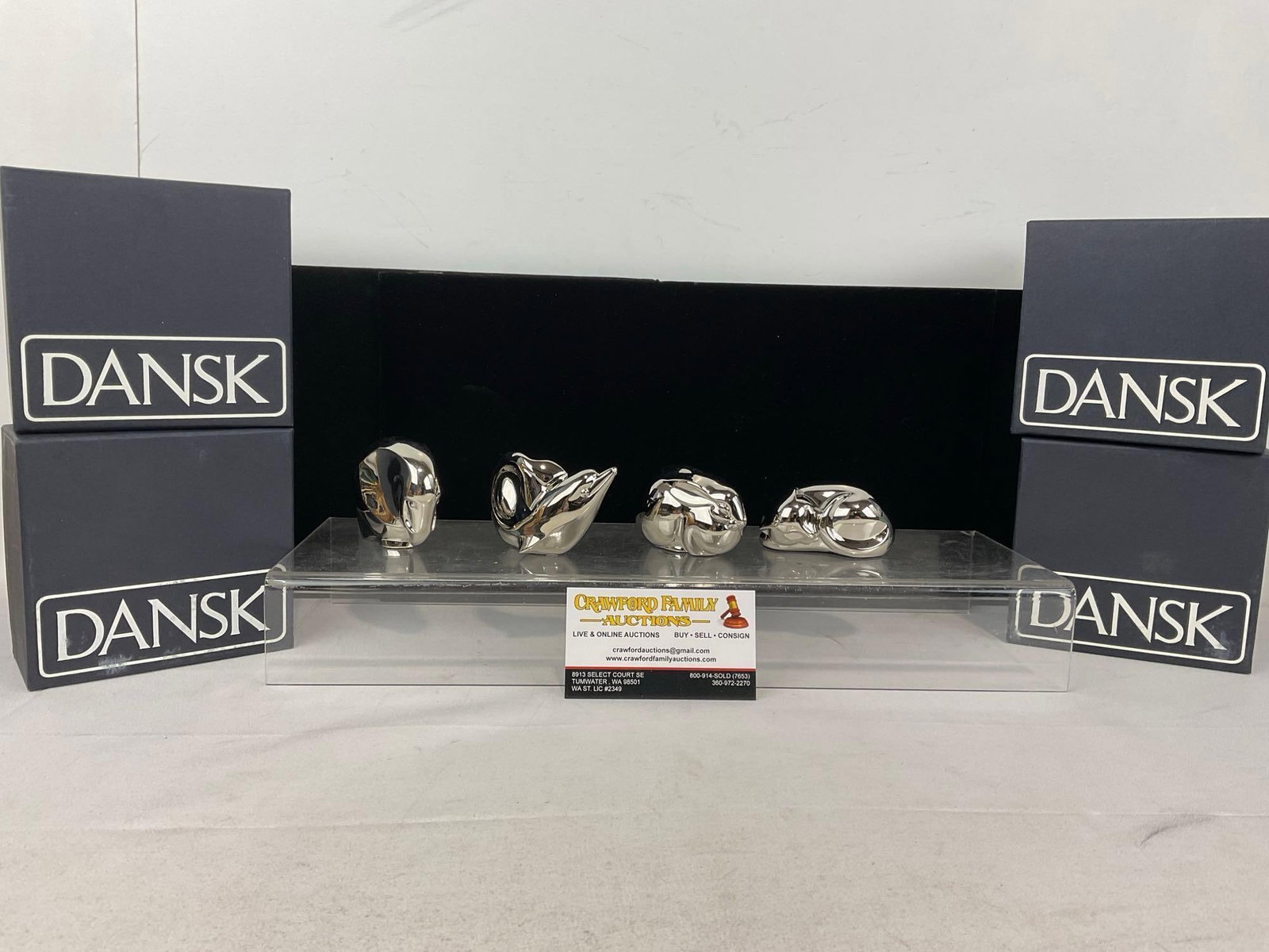 4 Dansk Silverplated Animal Figurines, 680/6215-680/6218, in original boxes: Appears to be in good shape. The pieces in box together measures approx 6h x 11w x 6d inches. See pics. E-6080