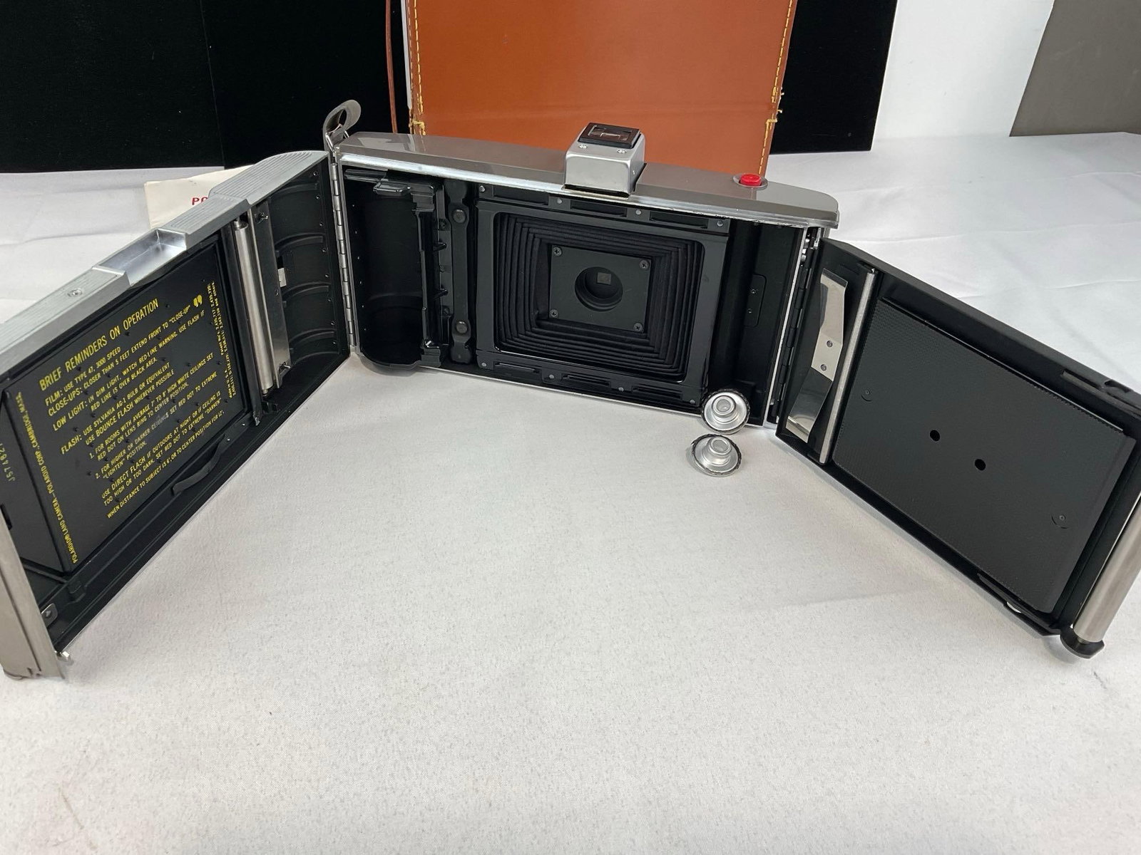 Vintage Polaroid Land Camera model J66, Electric Eye, w/booklet & leather case - 6