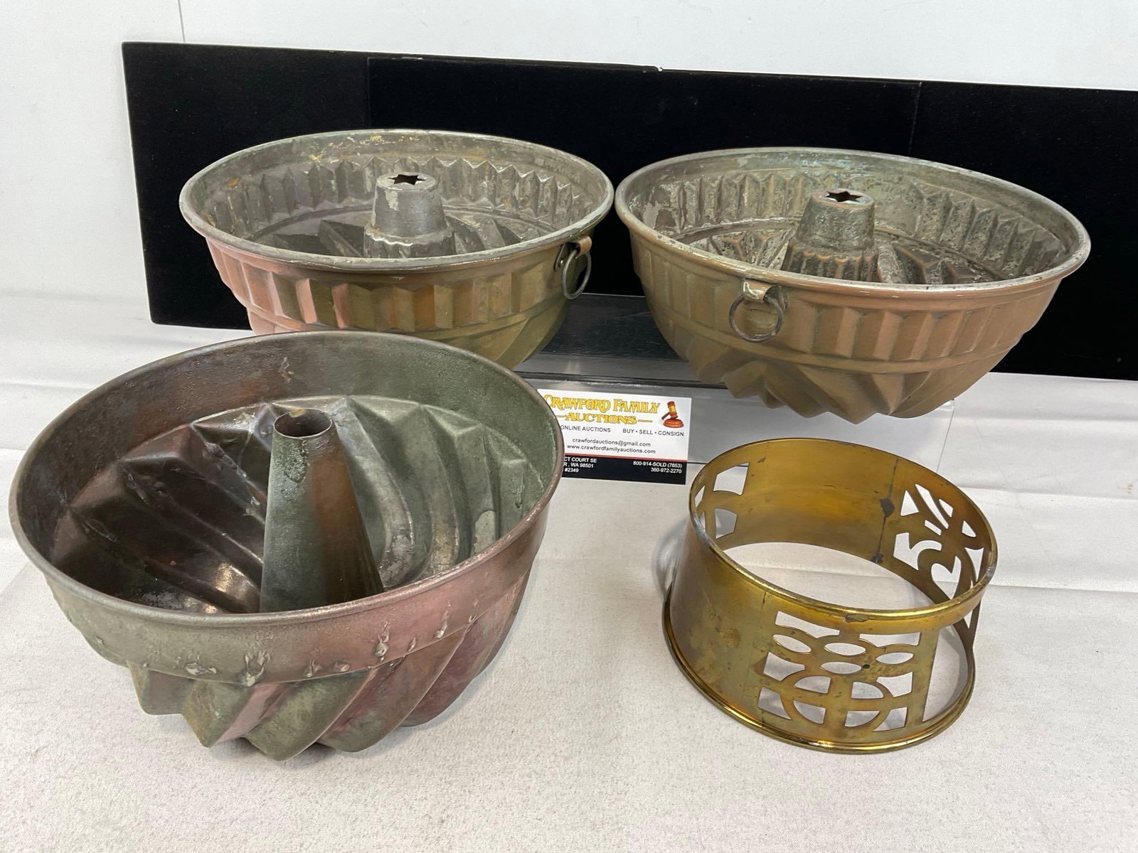 3 Vintage Copper clad Tin Bundt Cake Molds & Vintage Napkin Ring/Pan Stand: Appears to be in good shape. The piece measures approx 9h x 11w x 11d inches. See pics. E-6080
