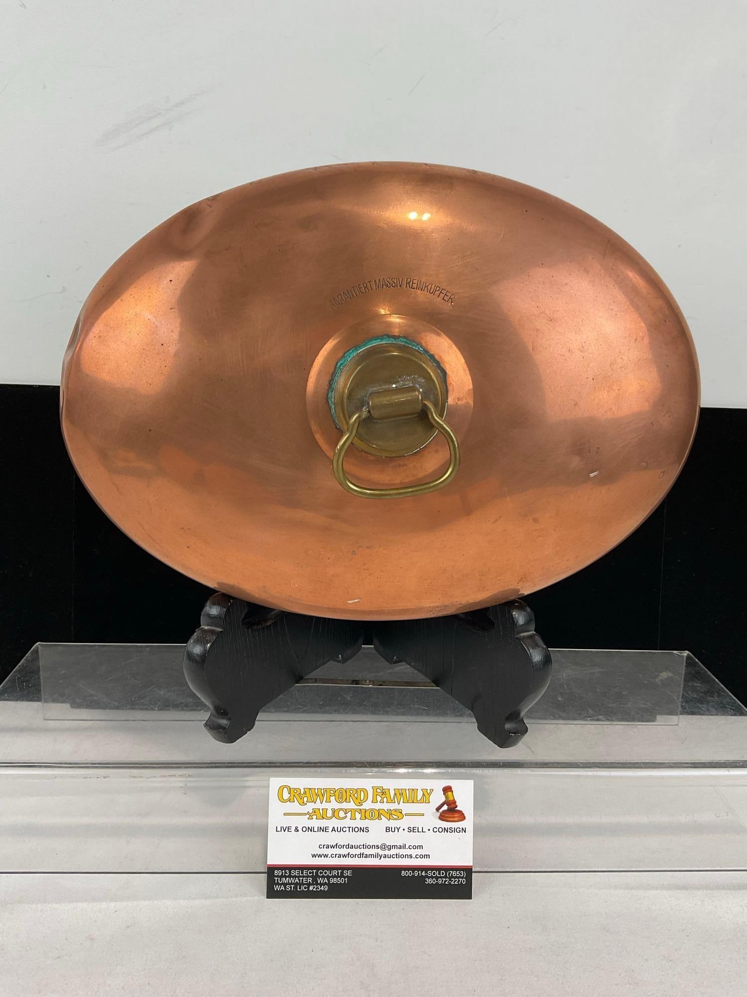 Vintage Hot Water Bottle, Copper Clad oval shape, 6h x 12w x 9d inches: Marked Garantiert Massiv Reinkupfer. Appears to be in good shape. The piece measures approx 6h x 12w x 9d inches. See pics. E-6080