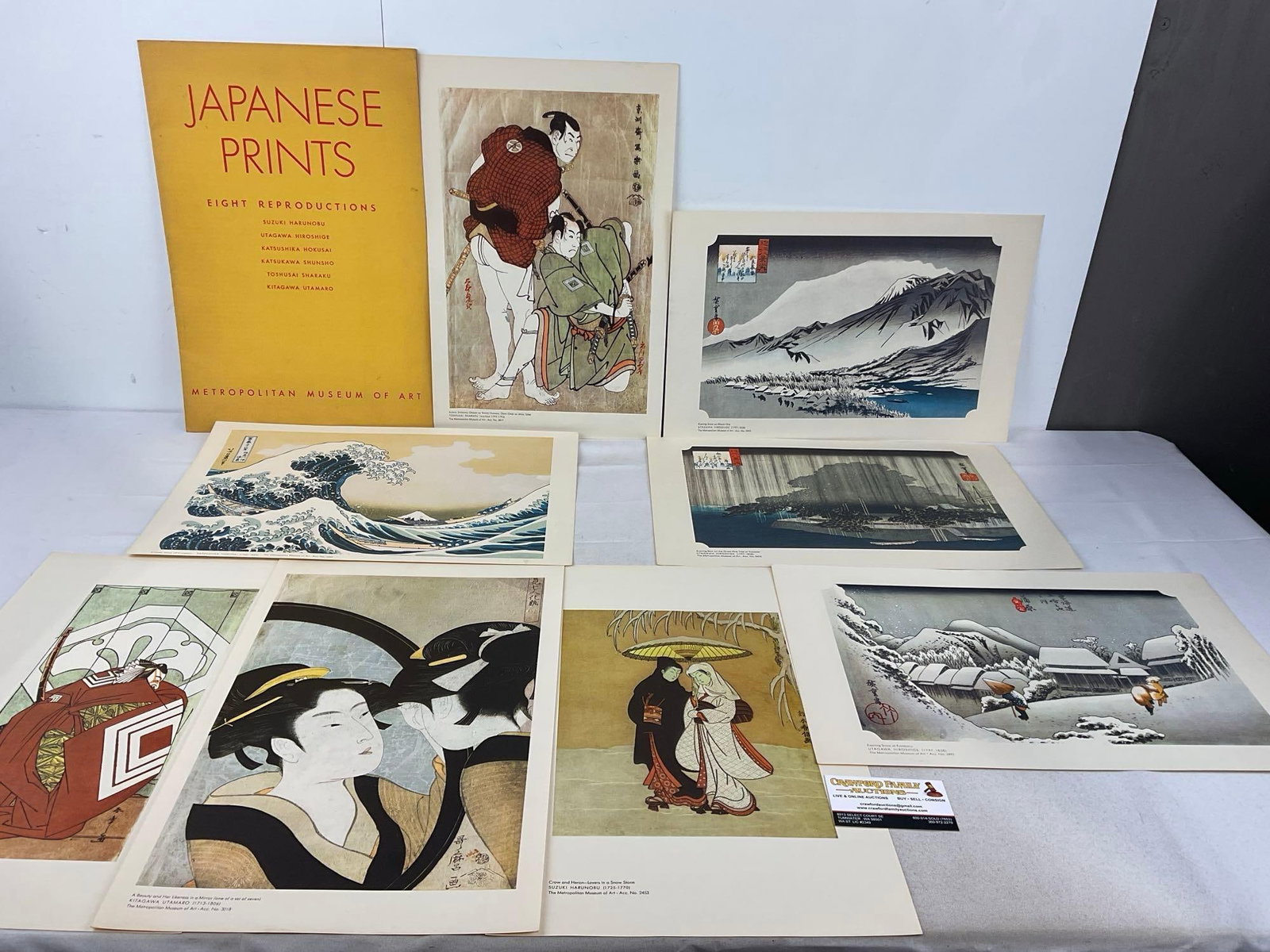 8 Repro Japanese Prints from Met. Museum of Art, Great Wave, Geishas, Samurai & more: Includes Prints by Suzuki Harunobu, Utagawa Hiroshige, Katsushika Hokusai, Katsukawa Shunsho, Toshusai Sharaku, & Kitagawa Utamaro. Appears to be in good shape. The piece measures approx 18h x 13w