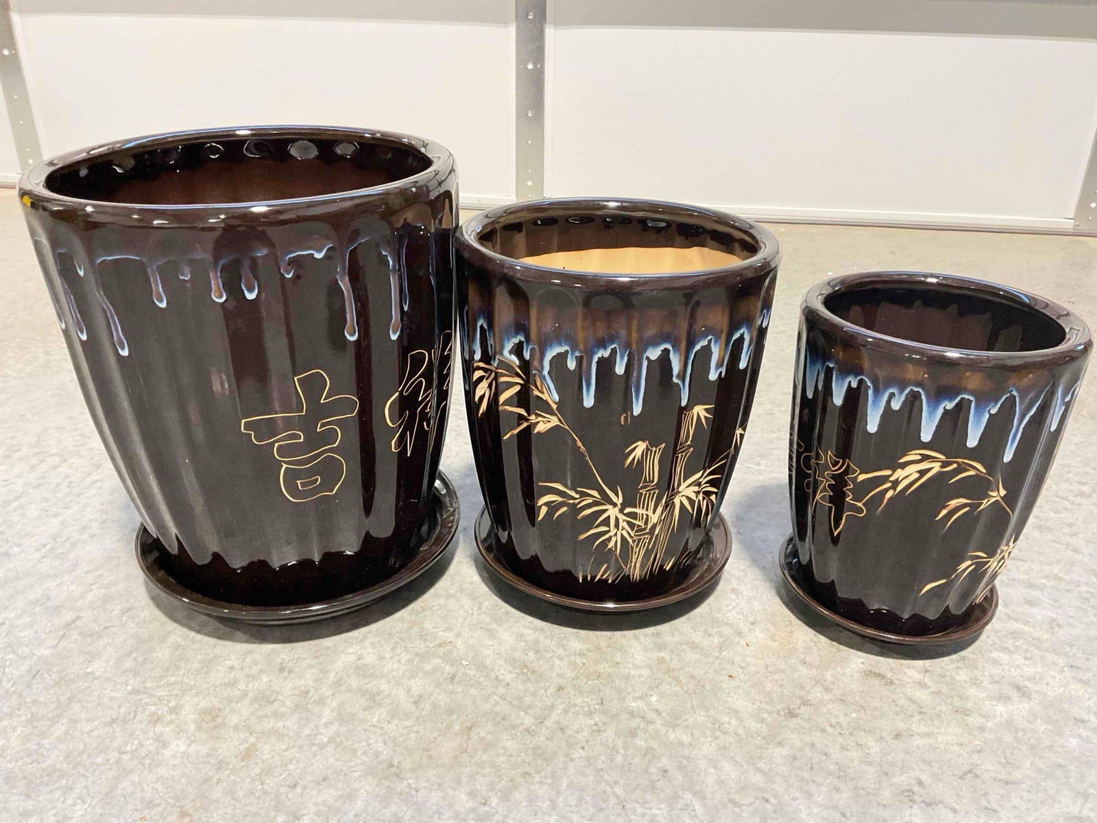 NIB 3 pcs Brown Glazed Ceramic Planter Pots w/ Chinese Calligraphy & Bamboo Design.: NIB 3 pcs Brown Glazed Ceramic Planter Pots w/ Chinese Calligraphy & Bamboo Design. Box opened for photography, otherwise looks to be in good condition. largest measures 11" x 11" x 15" DM-6130