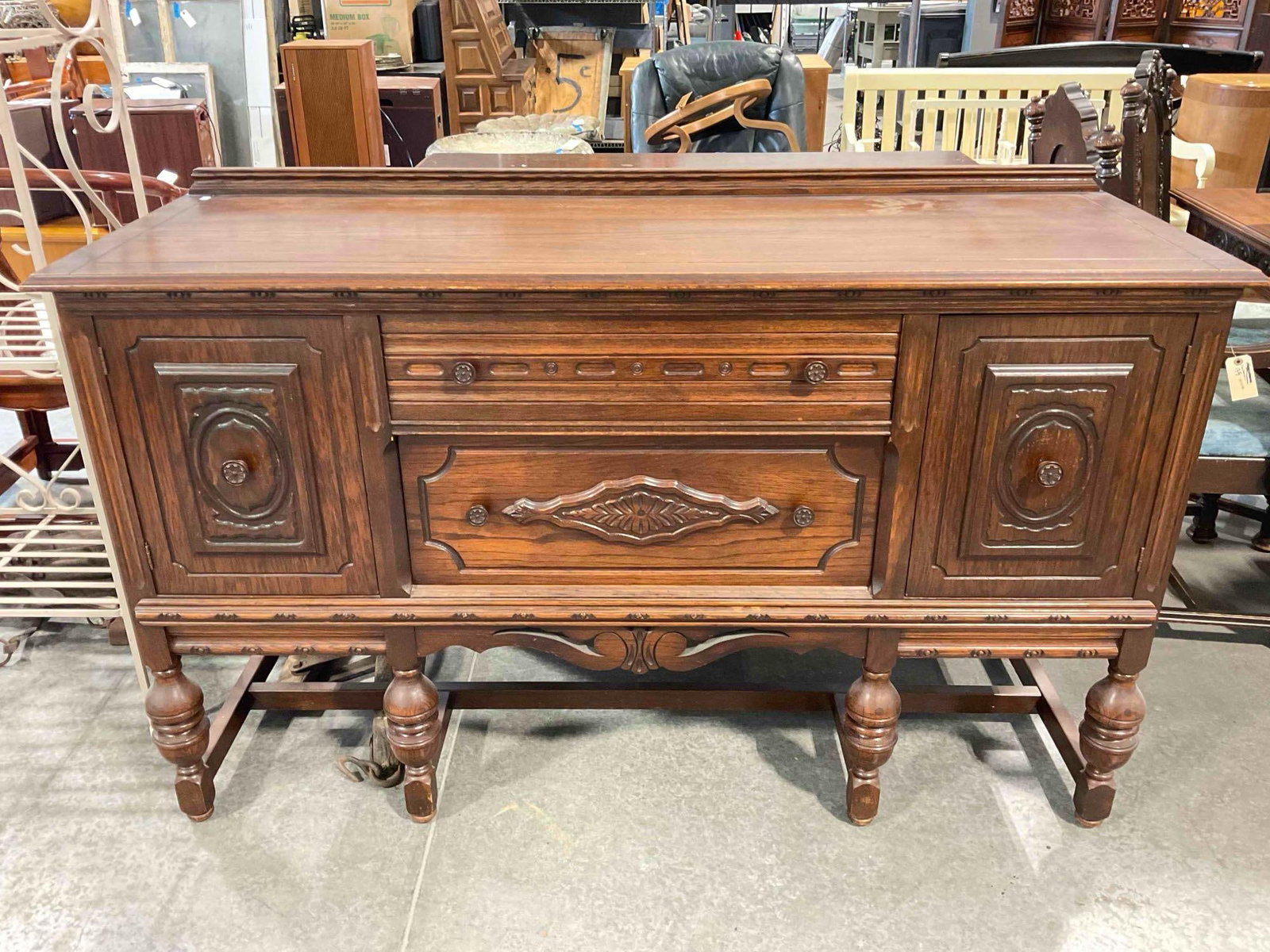 Vintage Jacobean Revival Walnut? Finish Wood Buffet w/ 2 Drawers & 2 Cupboards. See pics.: Vintage Jacobean Revival Walnut? Finish Wood Buffet w/ 2 Drawers & 2 Cupboards. Piece has wear indicative of age and use, otherwise looks to be in fair to good condition. Measures 62" x 22" x 39" 