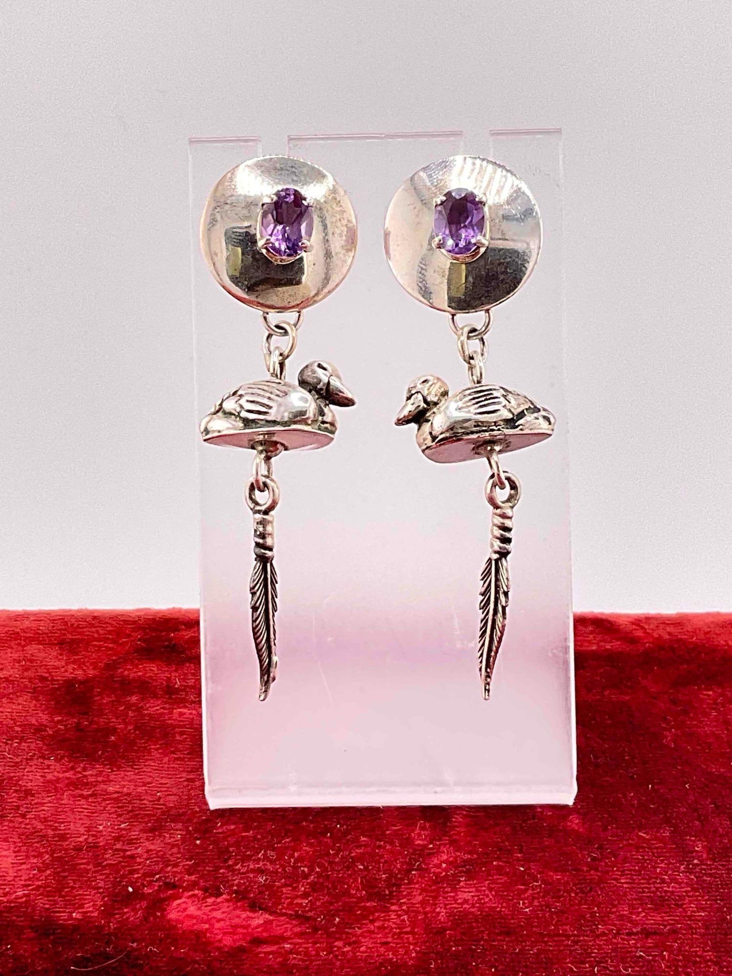 Vintage Carol Felley Sterling Silver Earrings w/ Amethyst Toned Setting & Duck Design. See pics.: Vintage Carol Felley Sterling Silver Earrings w/ Amethyst Toned Setting & Duck Design. DO NOT Have Earring Backs, rubber backs are used for Photography purposes only. Weighs 19 grams. DM-414