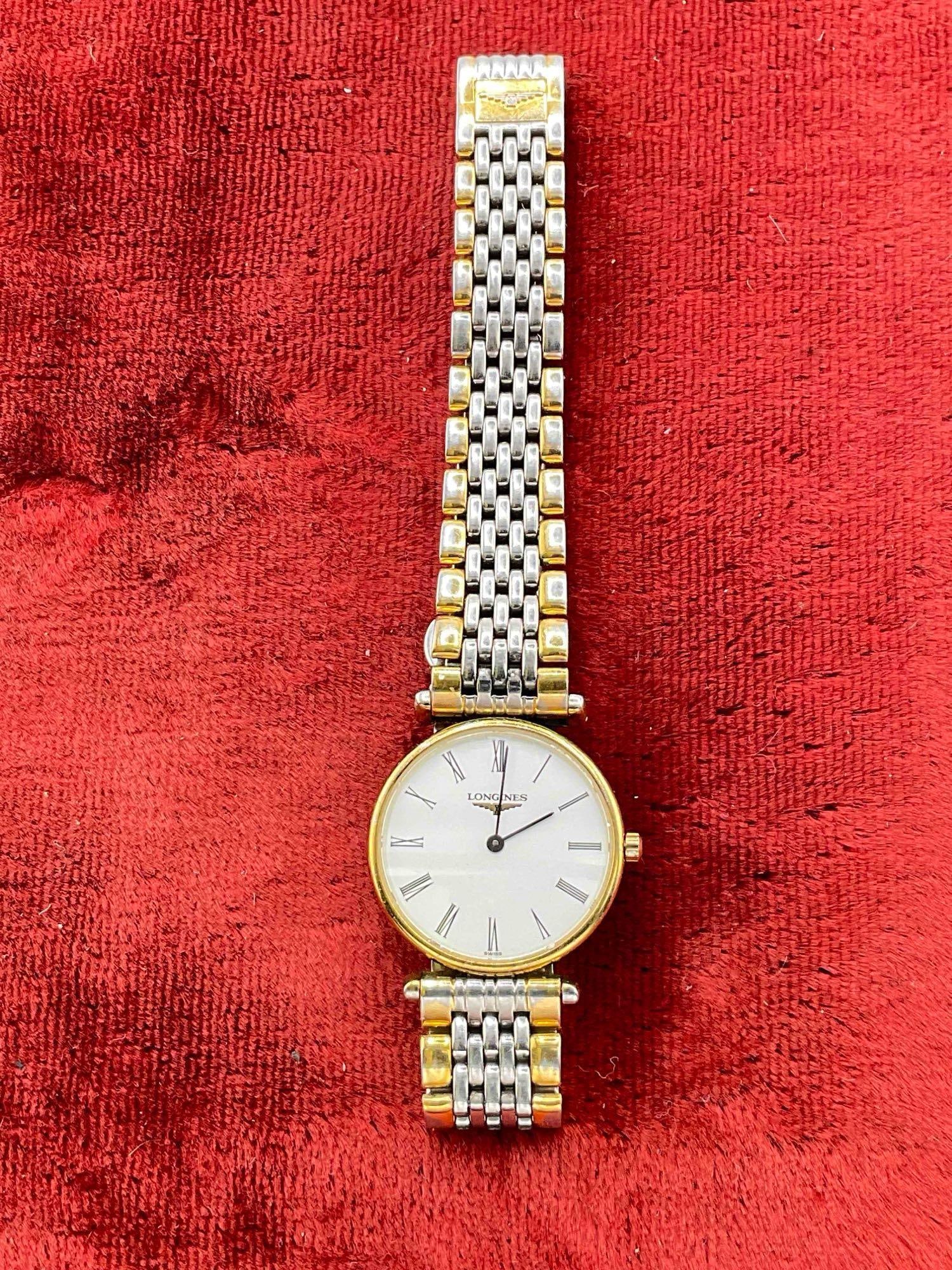 Vintage Longines La Grande Classique Womens swiss made quartz ultra slim watch L4.135.2: C-6110 Highly elegant, ultra-slim women's dress watch renowned for its minimalist design. It typically features a 24mm to 25mm yellow gold-plated steel case, a reliable Swiss quartz movement, an
