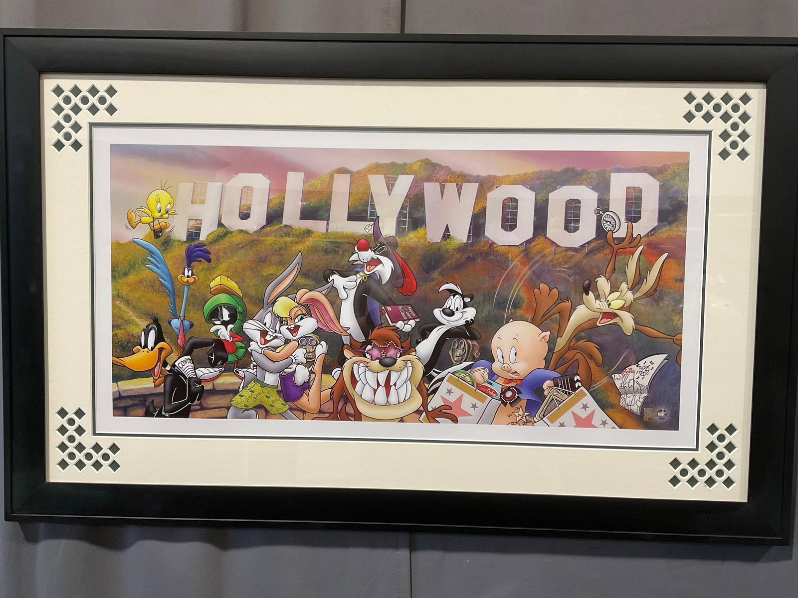 Framed #d 2691/5000 Sericel Looney Tunes at the Hollywood Sign, 24x38 inches: Has a hologram sticker, #38429302. Appears to be in good shape. The piece measures approx 24h x 38w x 3d inches. See pics. E-5980