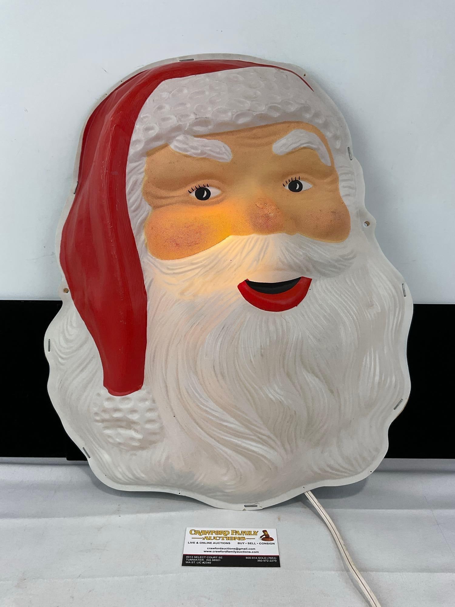 Vintage Santa Claus Face Lighted Sign, by Glolite, tested & working: Appears to be in good shape. The piece measures approx 24h x 16w x 7d inches. See pics. E-6120