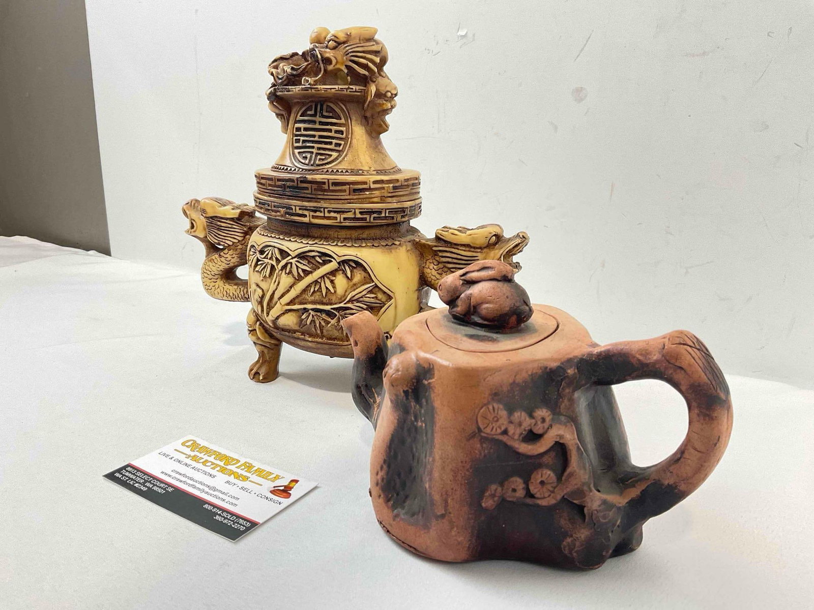 2 pcs Vintage Novelty Tea Pots, incl. 1x Ochre Resin w/ Dragons & 1x Orange Ceramic w/ Rabbit. - 2