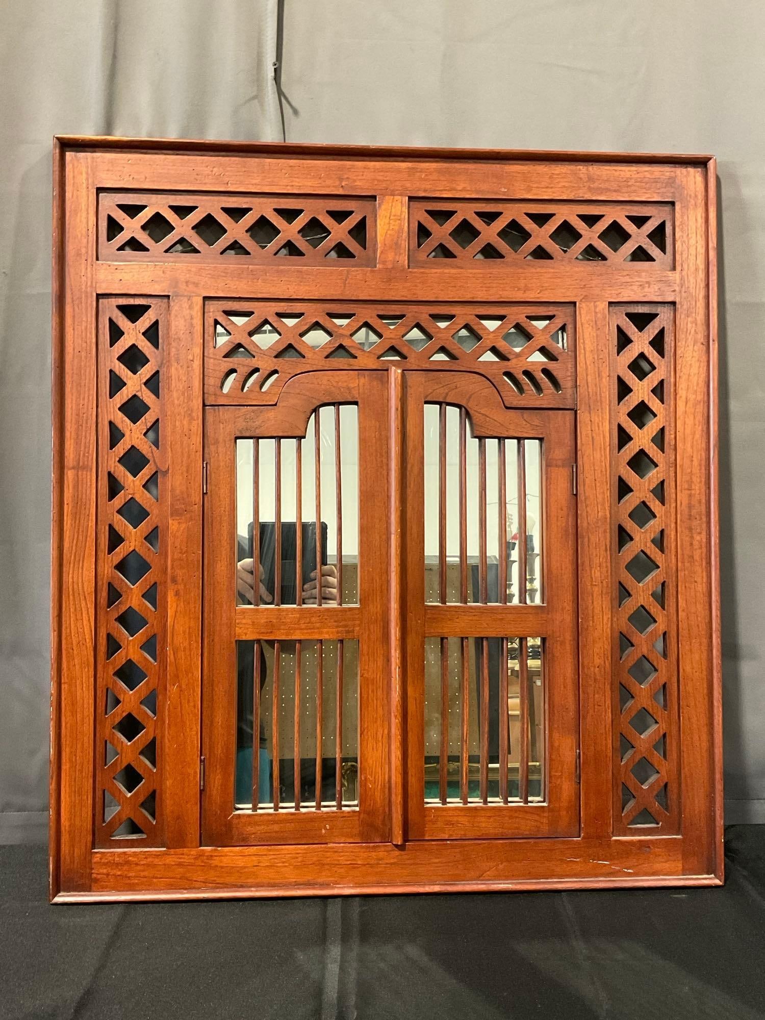 Large Teak Window Mirror, w/Lattice 38h x 34w x 4d inches: Appears to be in good shape. The piece measures approx 38h x 34w x 4d inches. See pics. E-6080 *Oversized shipping may apply*