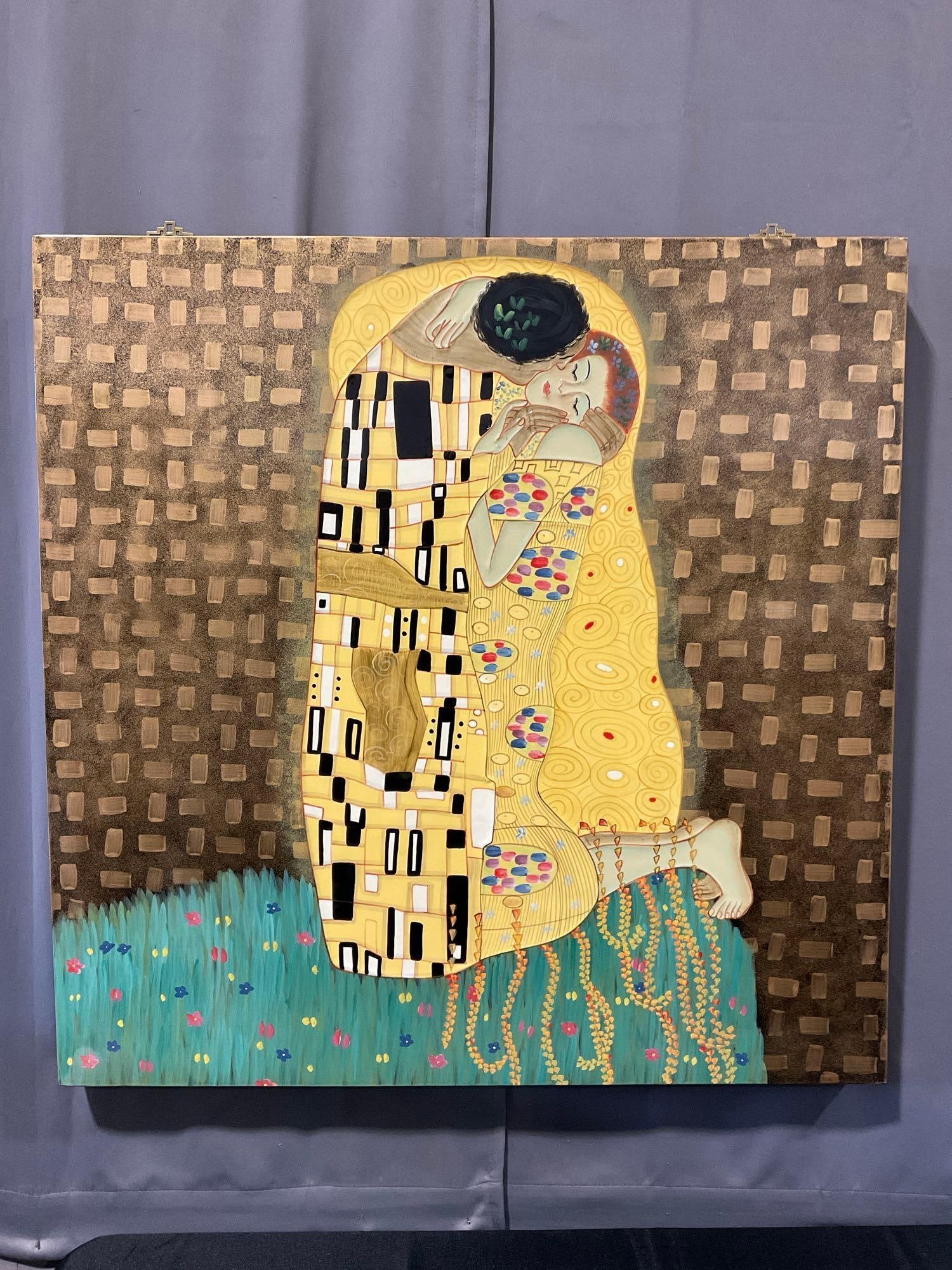 Framed Reproduction of The Kiss by Gustav Klimt, on Board, approx 37x36 inches Metallic finish: Appears to be in good shape. The piece measures approx 37h x 36w x 3d inches. See pics. E-6080 *Oversized shipping may apply*