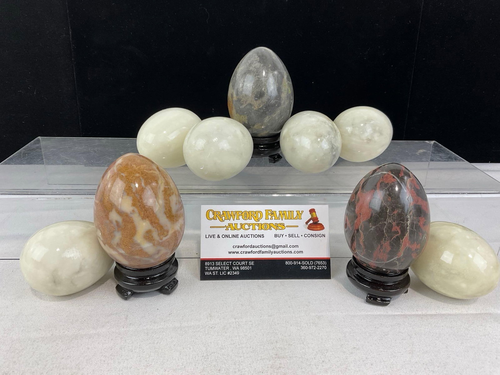 9 Stone Eggs, w/3 small wooden stands, Alabaster/Quartz, Jasper, & more: Appears to be in good shape. The piece measures approx 6h x 7w x 5d inches. See pics. E-6080