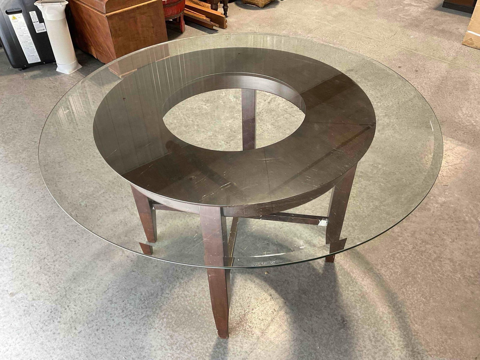 Modern Round Wooden Dining Table w/ Glass Top. Fair Condition. Measures 48" x 48" x 30": Modern Round Wooden Dining Table w/ Glass Top. Fair Condition. Measures 48" x 48" x 30" Piece has wear indicative of age and use, has had masking tape wrapped around parts of base, otherwise looks to 