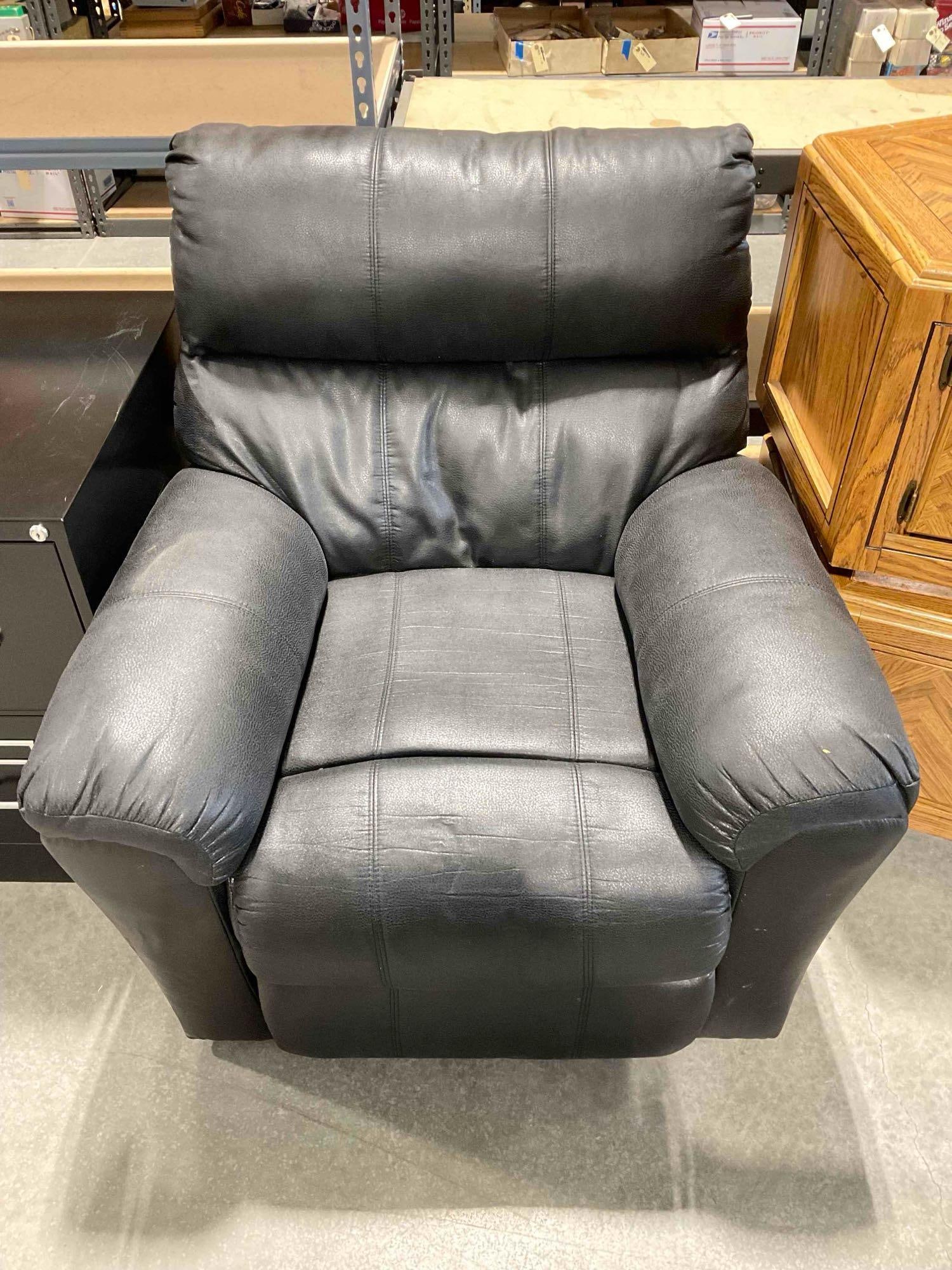 Plush Black Faux Leather Recliner Chair. Good Condition. Measures 40" x 38" x 38" See pics.: Plush Black Faux Leather Recliner Chair. Good Condition. Measures 40" x 38" x 38" Minor wear indicative of age and use, otherwise looks to be in good condition. dM-414