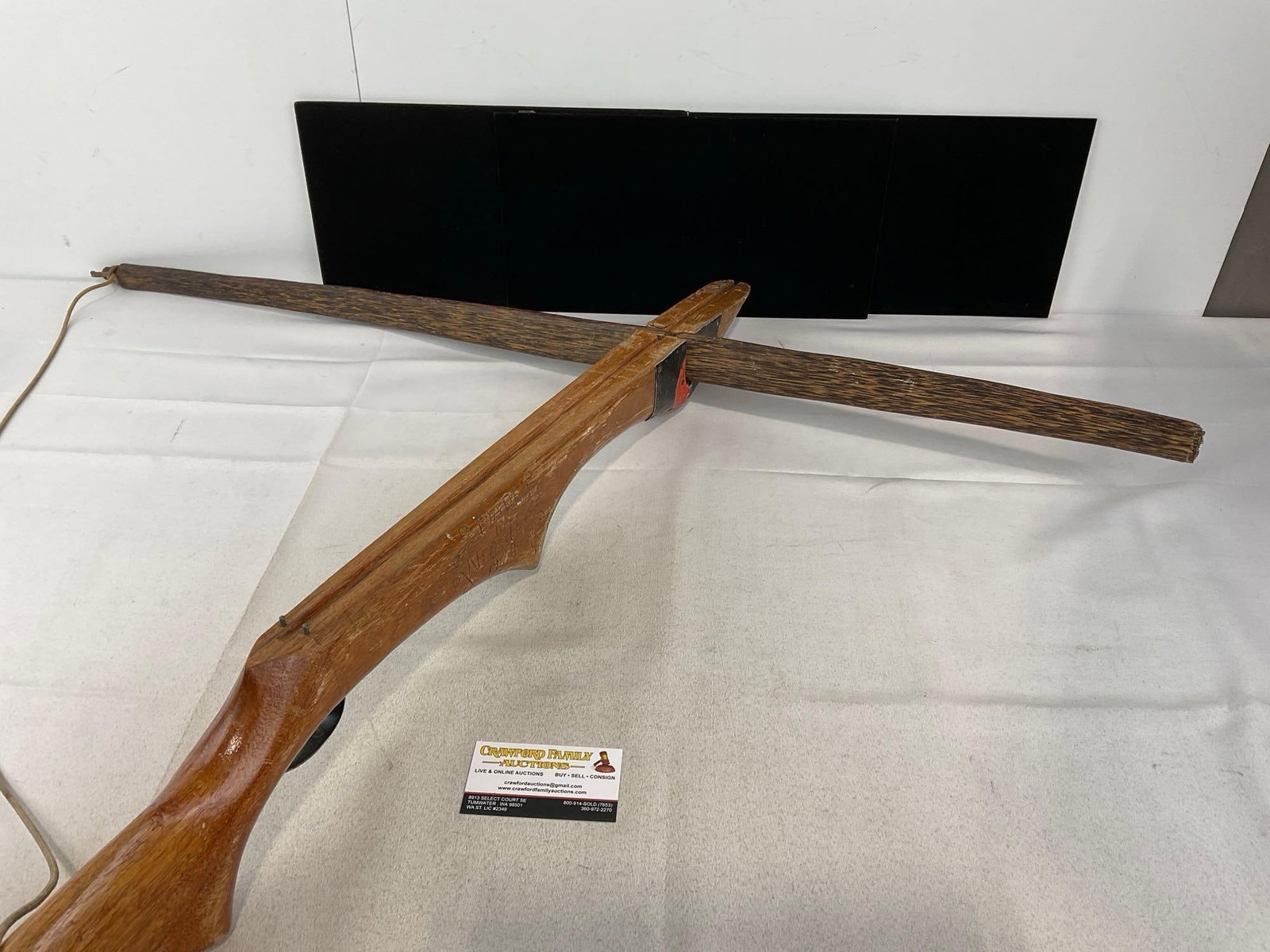 Primitive style crossbow, marked Made in Negrito 1974, Wooden Crossbar & Stock: Appears to be in fair shape, the cross bar seems to be broken off on one end, needs a new string and more. The piece measures approx 40h x 9w x 5d inches. See pics. E-5940