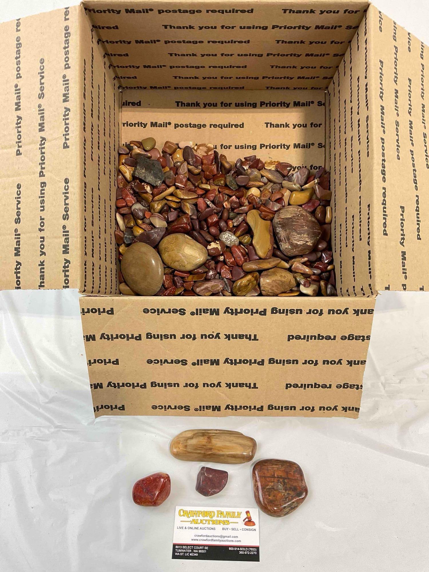 Uncounted Assortment of Largely Red Tumbled Stones, incl. Jaspers, Petrified Wood & More.: Uncounted Assortment of Largely Red Tumbled Stones, incl. Jaspers, Petrified Wood & More. Looks to be in good condition. Fits in box measuring 12" x 12" x 8" Dm-6030