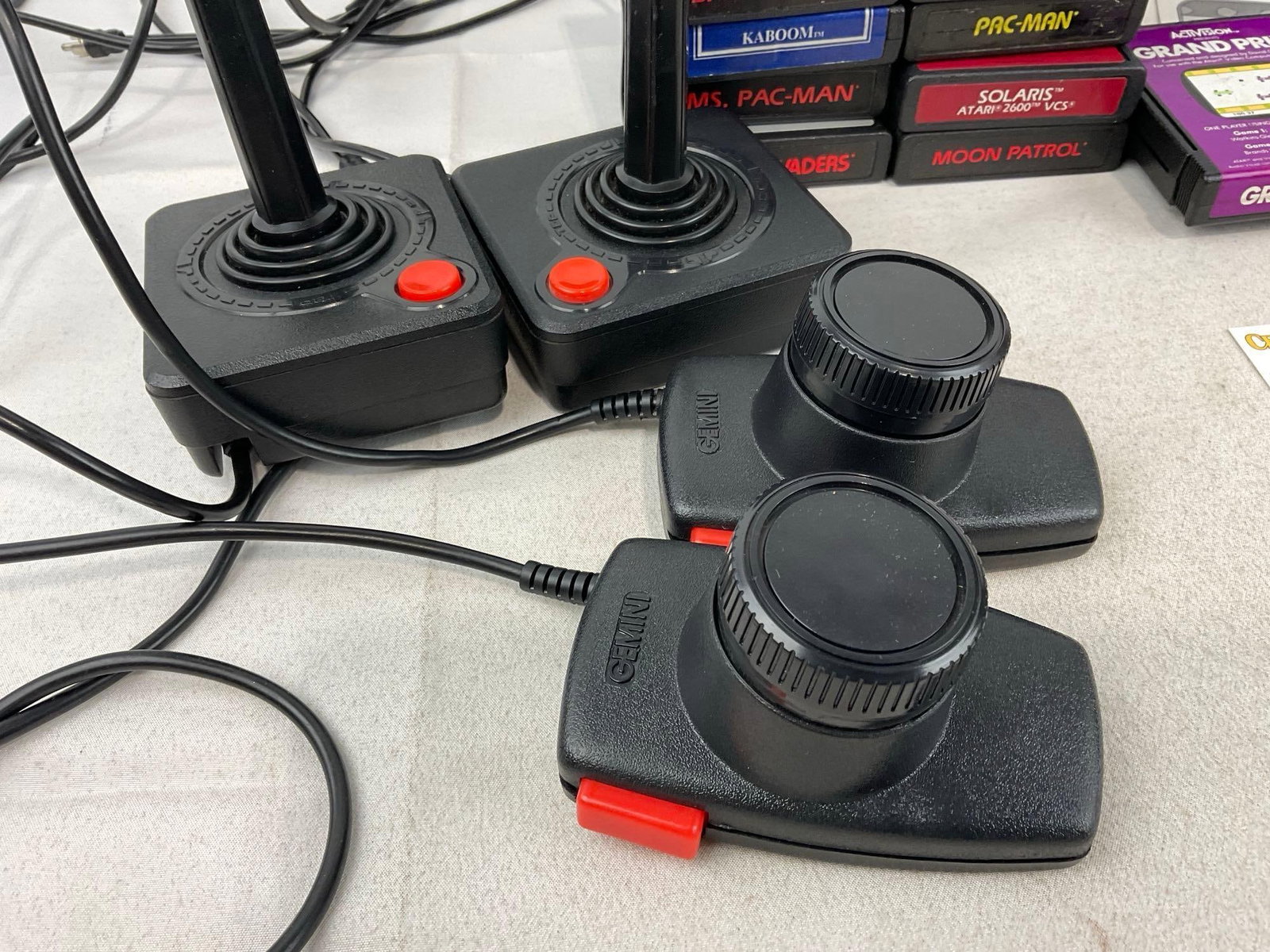 Atari 2600 w/controllers, 10 games, w/manuals, cables, tested & powers on - 2