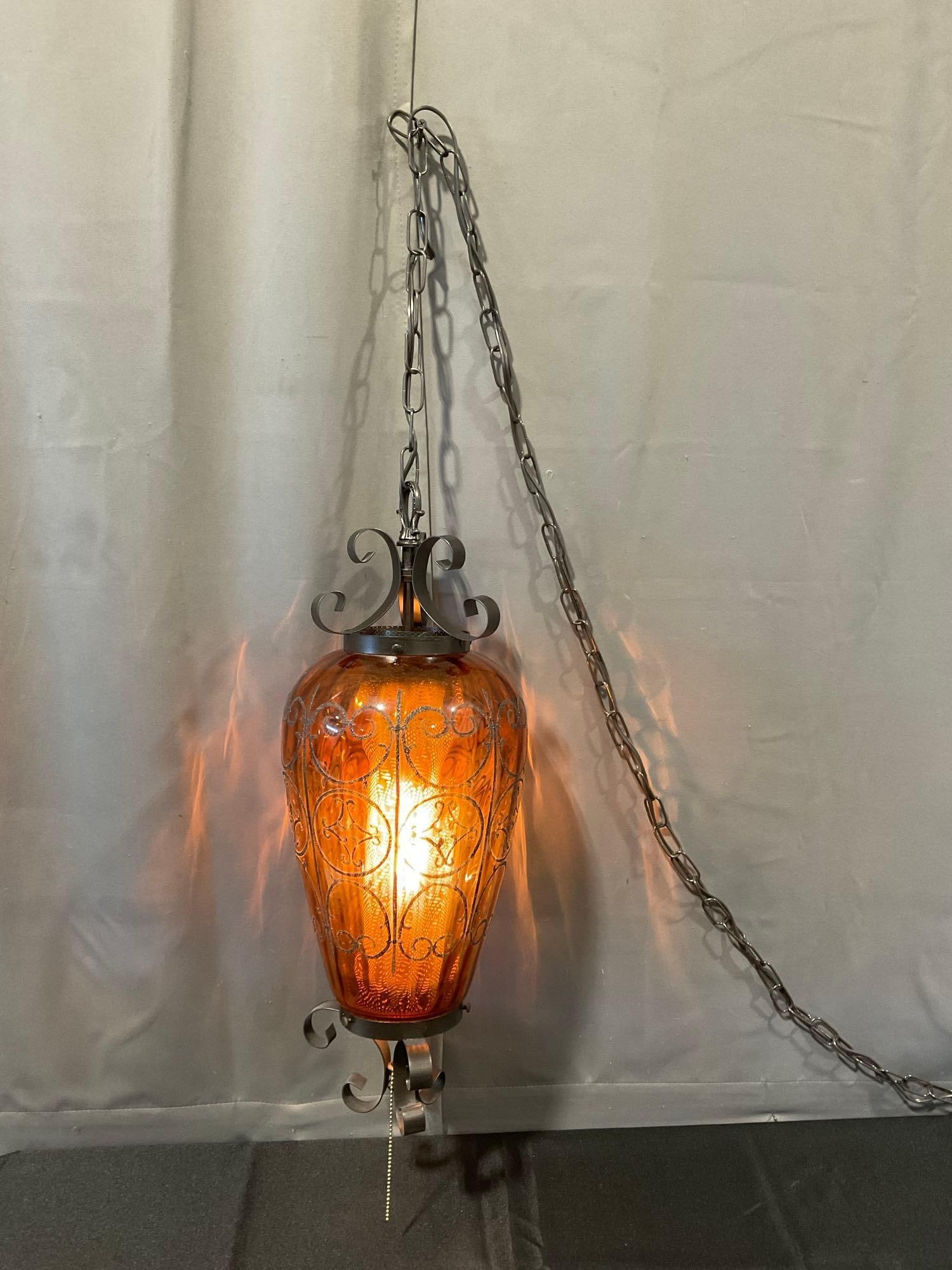 Lovely Chain Hanging Swag Lamp, Amber Glass Shade, 23h x 10w x 10d inches, tested & working: Appears to be in good shape. The piece measures approx 23h x 10w x 10d inches. See pics. E-5980