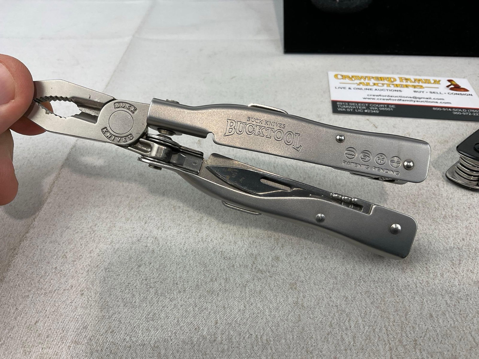 3 Multitools, Bucktool Model 380, Craftsman & another, in two pieces, w/sheaths - 2