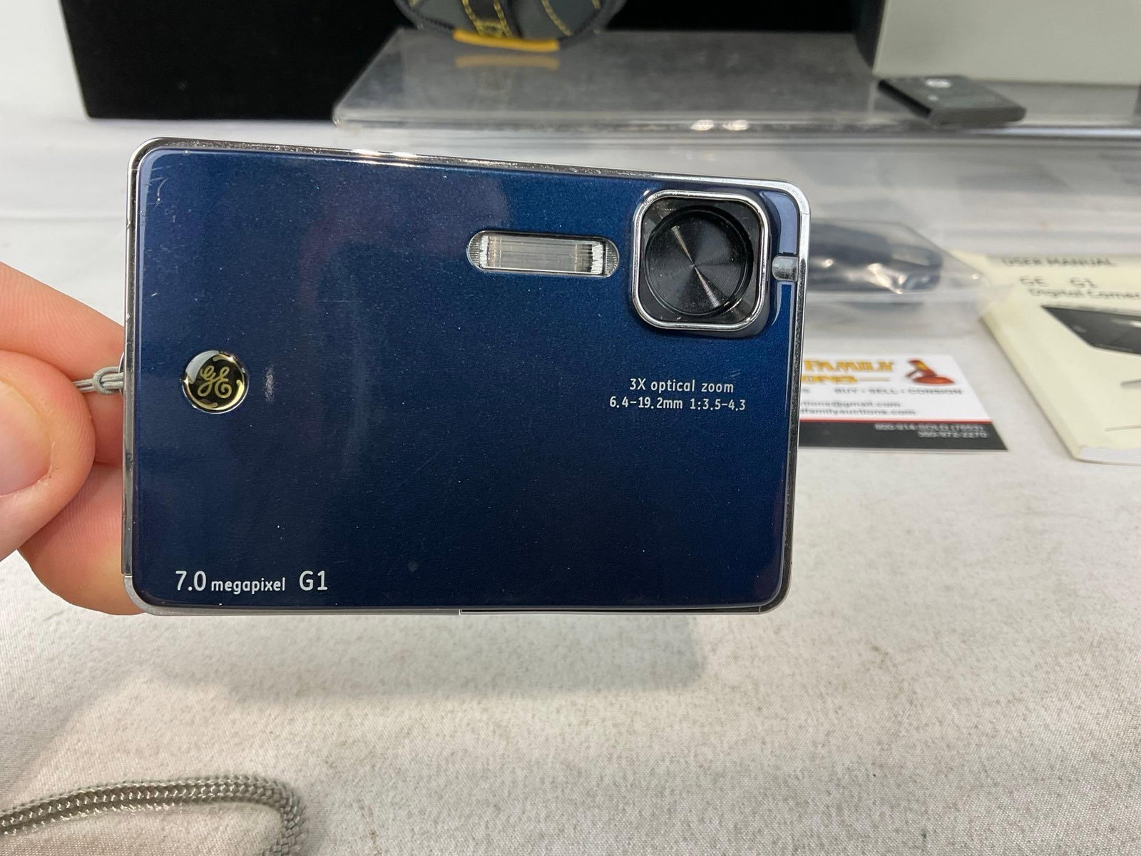 GE G1 Digital Camera, Dark Navy Blue, w/extra battery, 2gb sd card, w/original box, Body Glove Case - 2