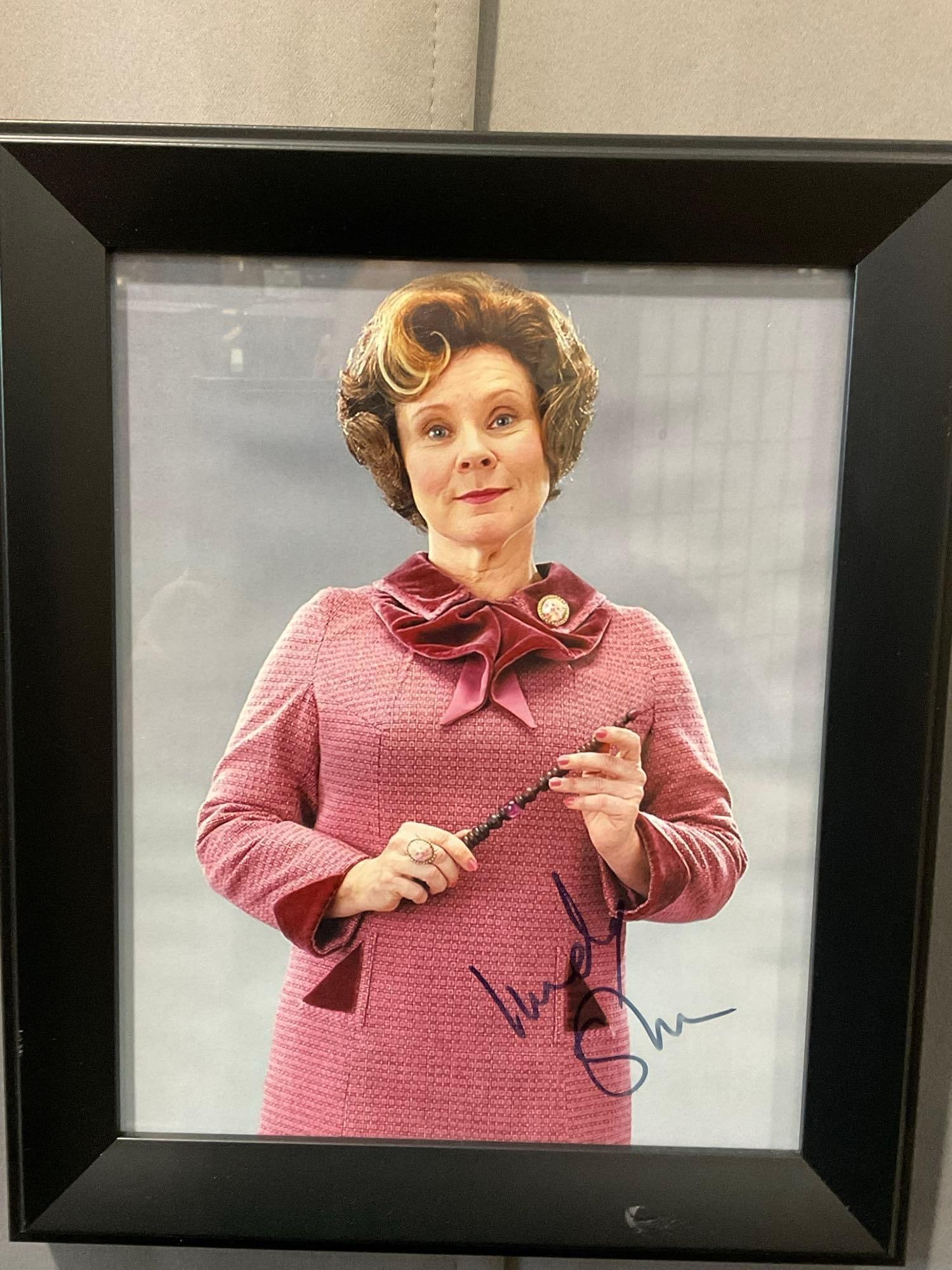 Framed Picture signed by Imelda Staunton as Dolores Umbridge from Harry Potter films, 13x11 inches: This from the collection of the late owner of a signed items collection store. Appears to be in good shape. The piece measures approx 13h x 11w x 3d inches. See pics. E-6220