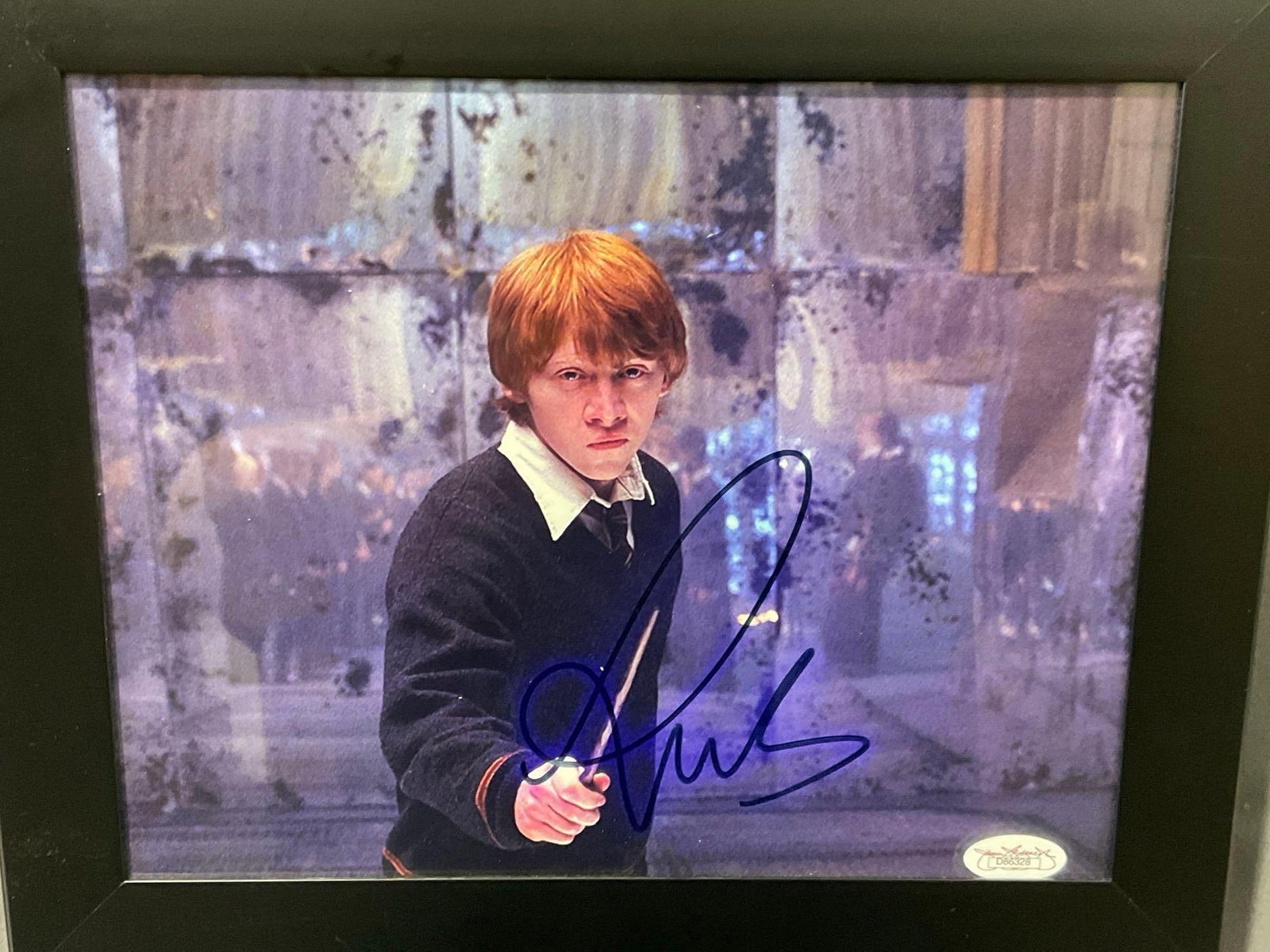 Framed Picture signed by Rupert Grint as Ron Weasley from Harry Potter films, 13x11 inches: This from the collection of the late owner of a signed items collection store. Appears to be in good shape. The piece measures approx 11h x 13w x 3d inches. See pics. E-6220