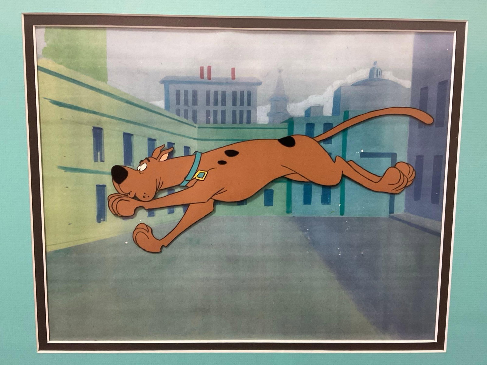 Framed Scooby-Doo Cartoon Animation Cel, 16h x 19w inches: This from the collection of the late owner of a signed items collection store. Appears to be in good shape. The piece measures approx 16h x 19w x 3d inches. See pics. E-6220