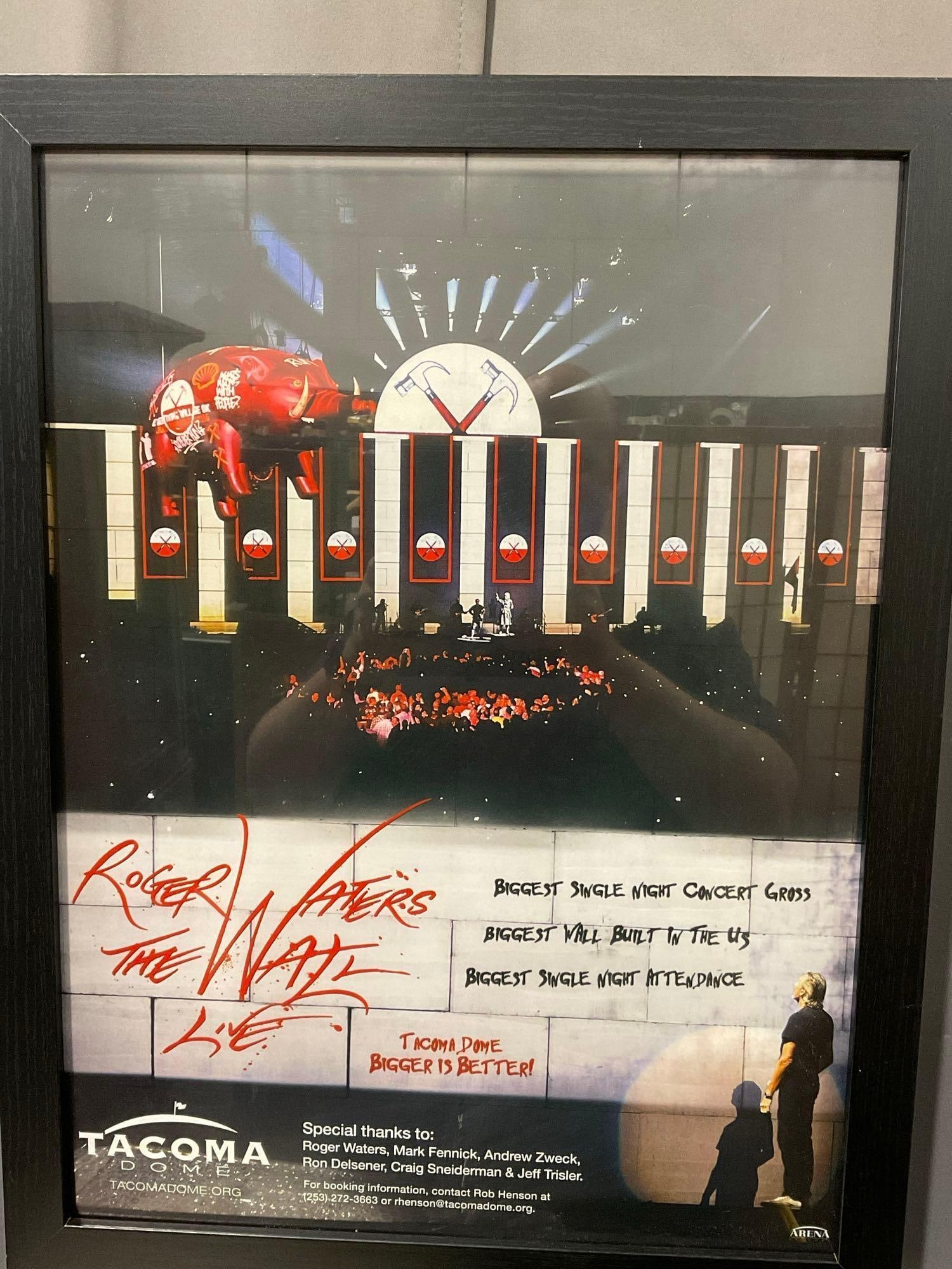 Framed Roger Waters The Wall Live Poster, Tacoma Dome, 27x21 inches: This from the collection of the late owner of a Collection Store. Appears to be in good shape. The piece measures approx 27h x 21w x 3d inches. See pics. E-6220