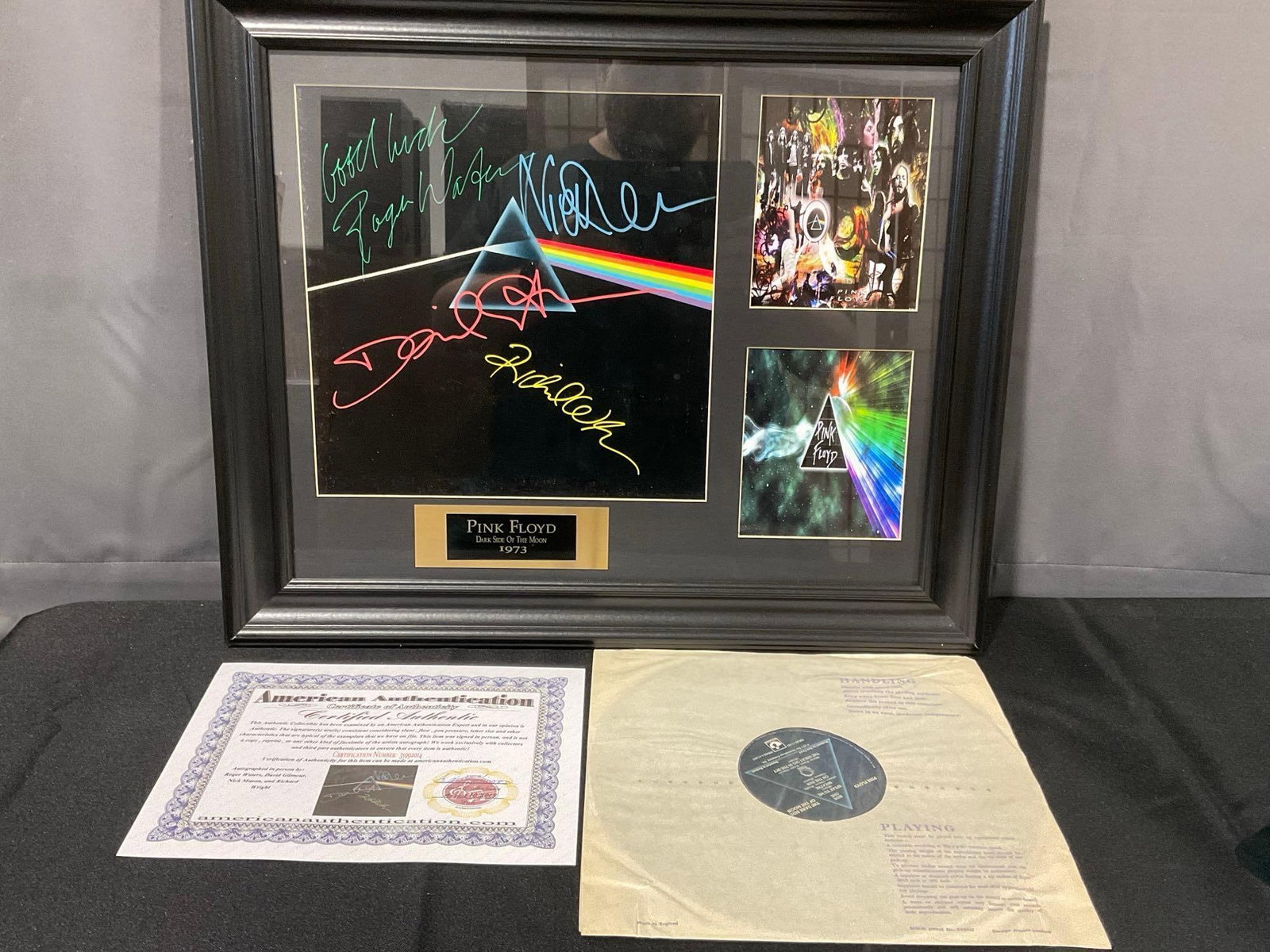 Framed Signed Pink Floyd Dark Side of the Moon Record w/COA, signed by 4 band members, 21x25 inches: This from the collection of the late owner of a Collection Store. Record & COA in sleeves on back. The COA says signed in person by Roger Waters, David Gilmour, Nick Mason, & Richard