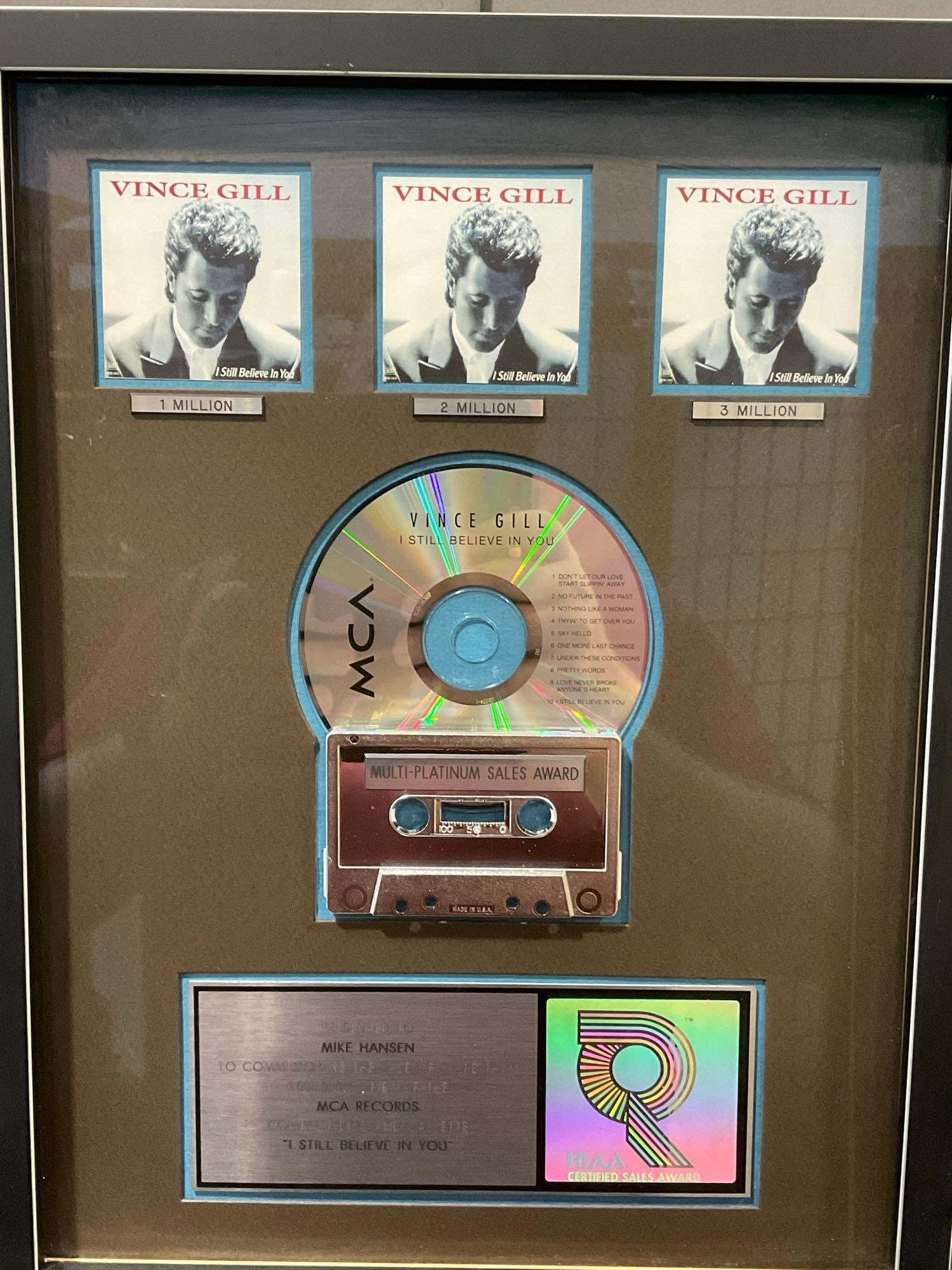 Framed Shadowbox, Vince Gill RIAA I Still Believe In You, MCA Records Multi-Platinum Sales Award: This from the collection of the late owner of a Collection Store. 3,000,000 Copies of CD & Cassette Sales, Appears to be in good shape. The piece measures approx 18h x 14w x 3d inches. See pics.