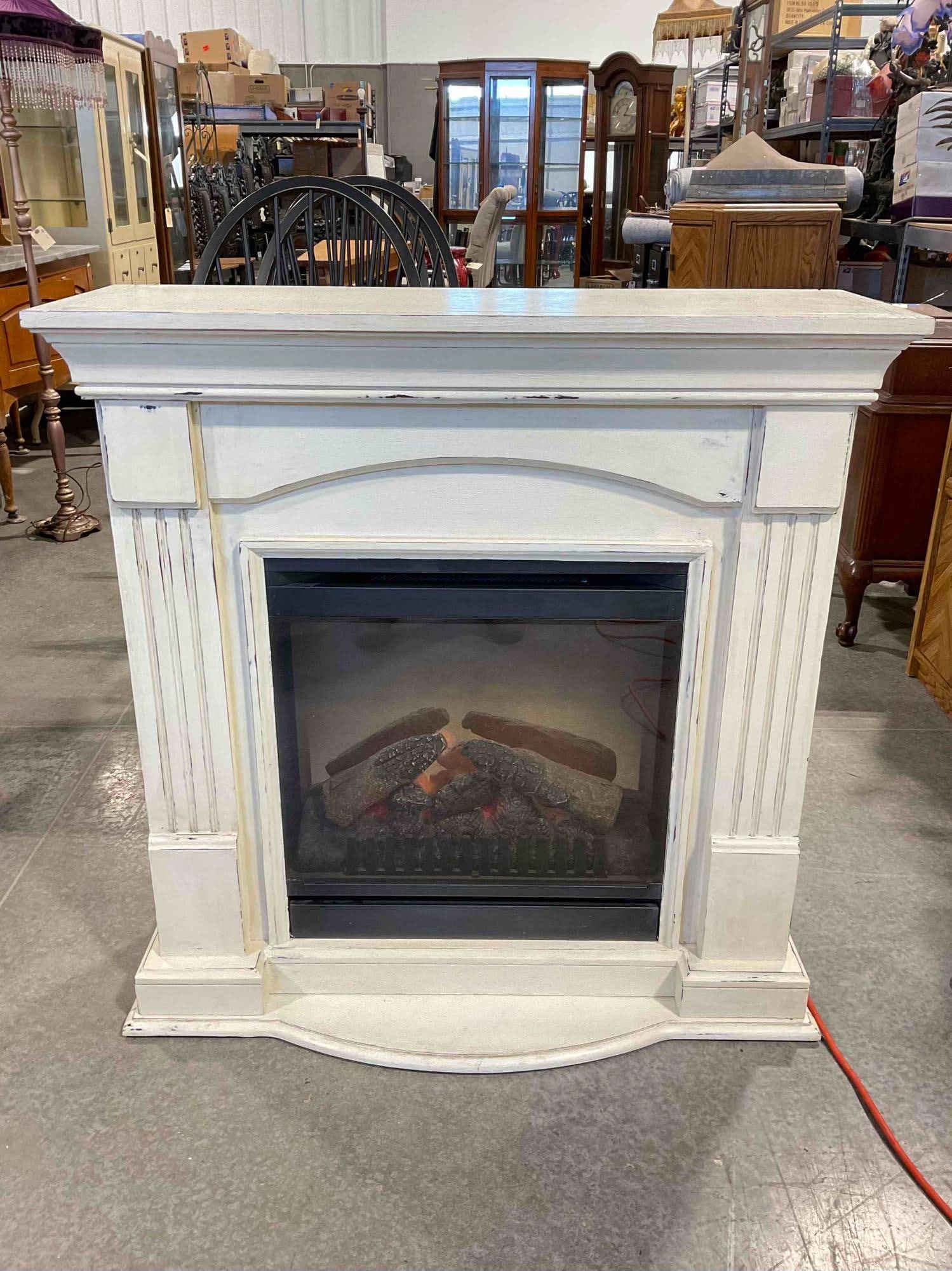 Dimplex Electric Fireplace w/ Ivory Painted Wooden Mantlepiece. Tested, Works. See pics.: Dimplex Electric Fireplace w/ Ivory Painted Wooden Mantlepiece. Tested, Works. model number 6901860600. Piece has been intentionally distressed, has minor wear indicative of age and use, otherwise