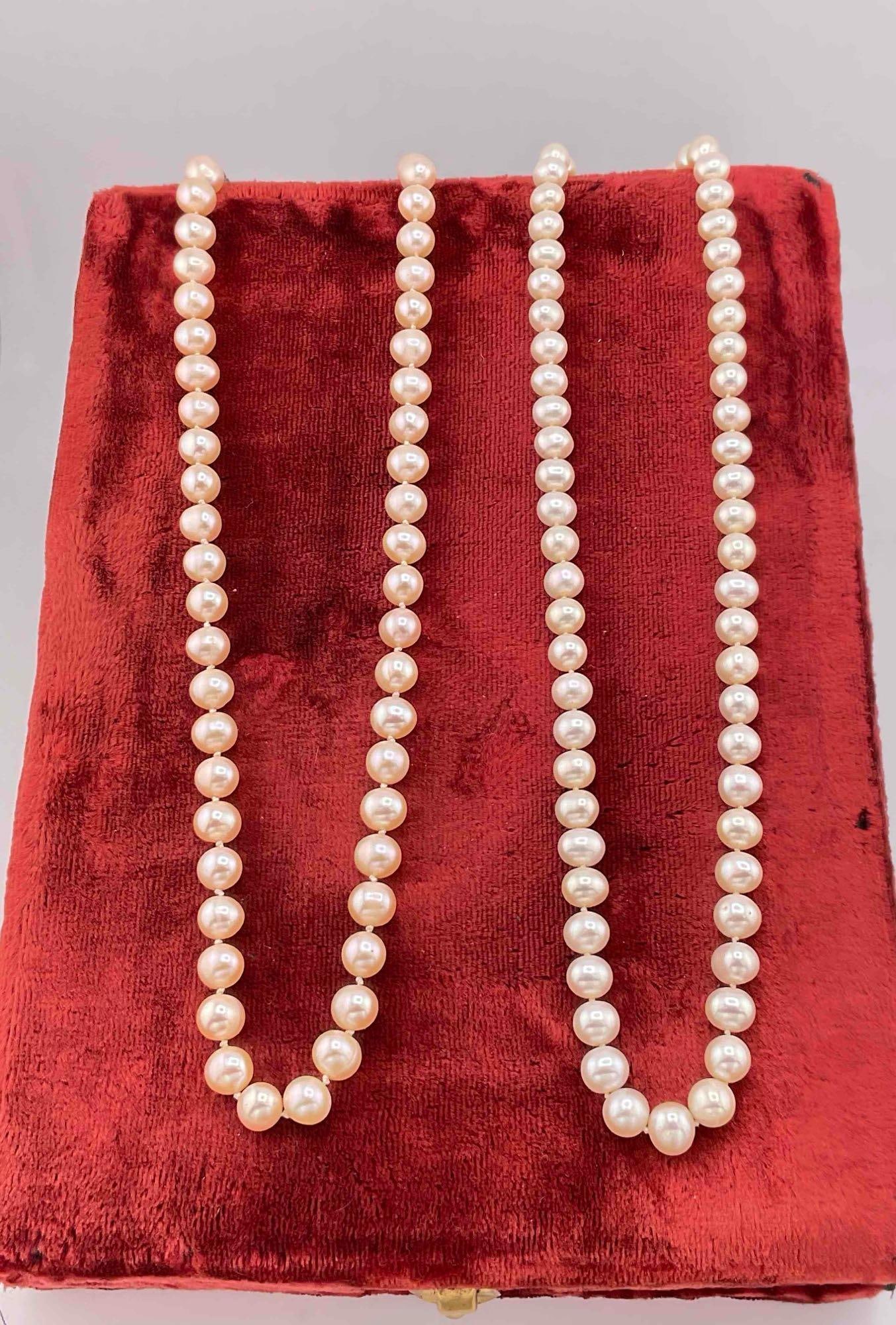 2 x pair of Pearl String necklaces both double knotted 1 w/ sterling clasp 1 w/ GP clasp: c-6110 both approx 17-18"