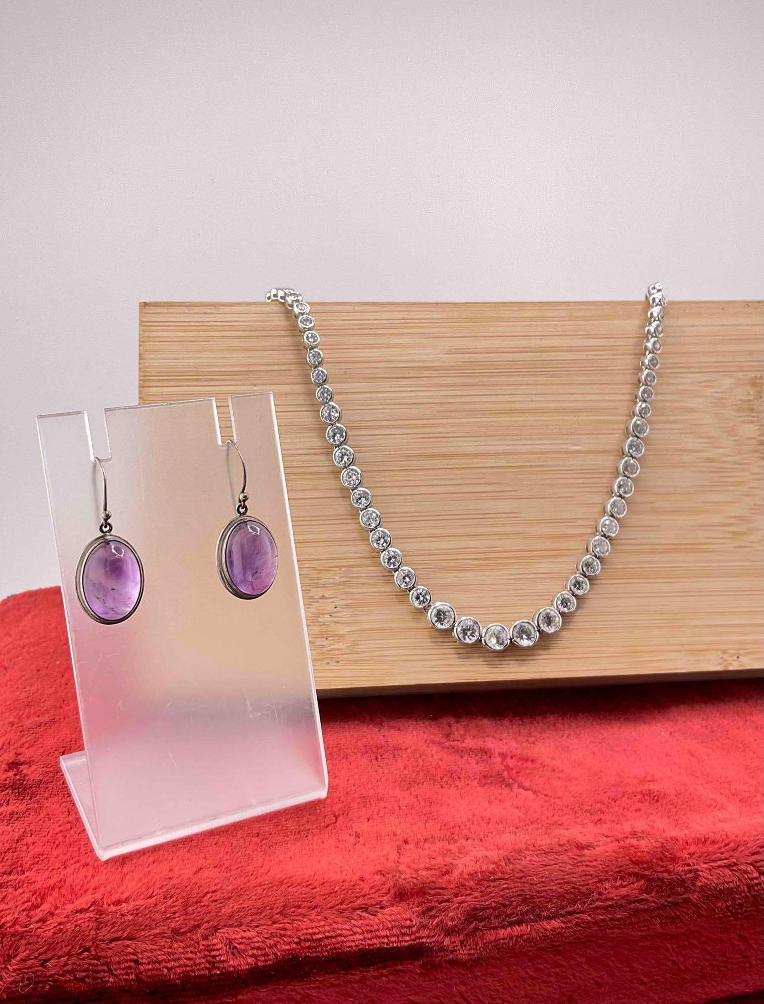 Sterling silver 16" Necklace w/ clear stones & pair of Sterling earrings w/ amethyst Cabochons: c-6110