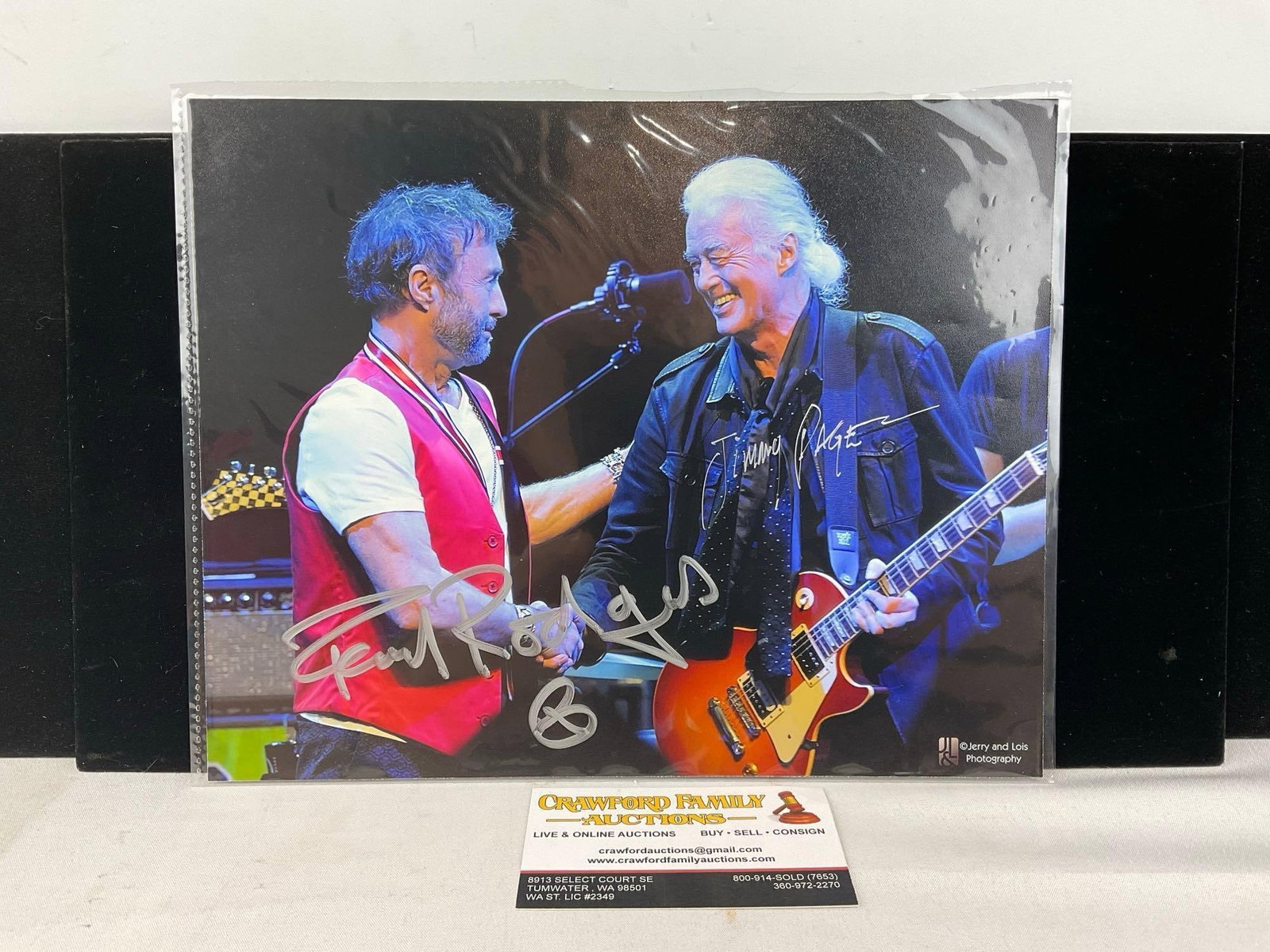 Signed Photograph of Jimmy Page & Paul Rodgers, 8x10 image: This from the collection of the late owner of a Collection Store. Appears to be in good shape. The piece measures approx 9h x 11w x 2d inches. See pics. E-6220