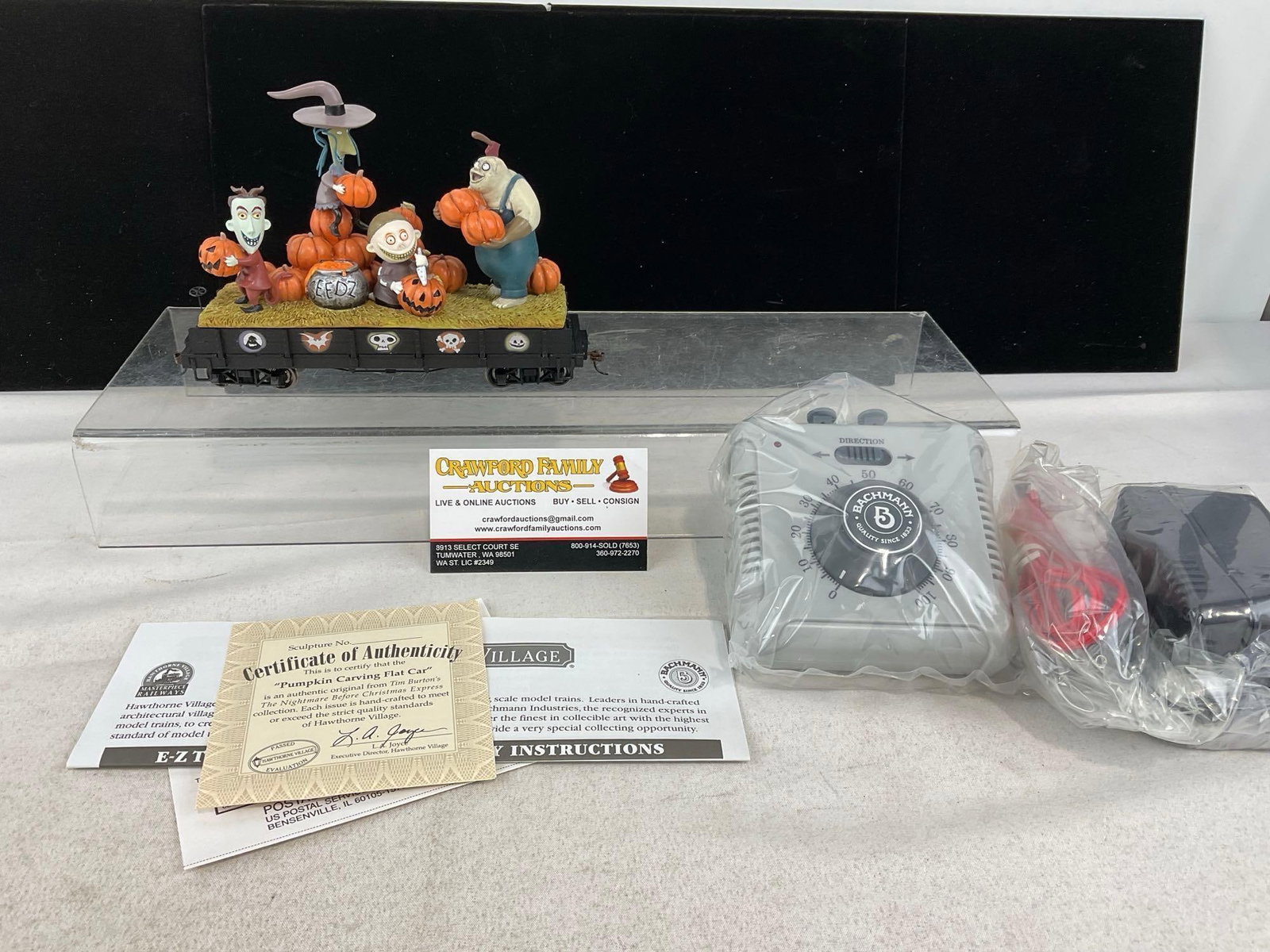 Hawthorne Village Nightmare Before Christmas Train Flat Car, w/Pumpkin Carving, 3rd issue, w/COA: In original foam, piece, no box though. Appears to be in good shape, electrics untested, only lightly used. The piece measures approx 8h x 19w x 15d inches. See pics. E-6160