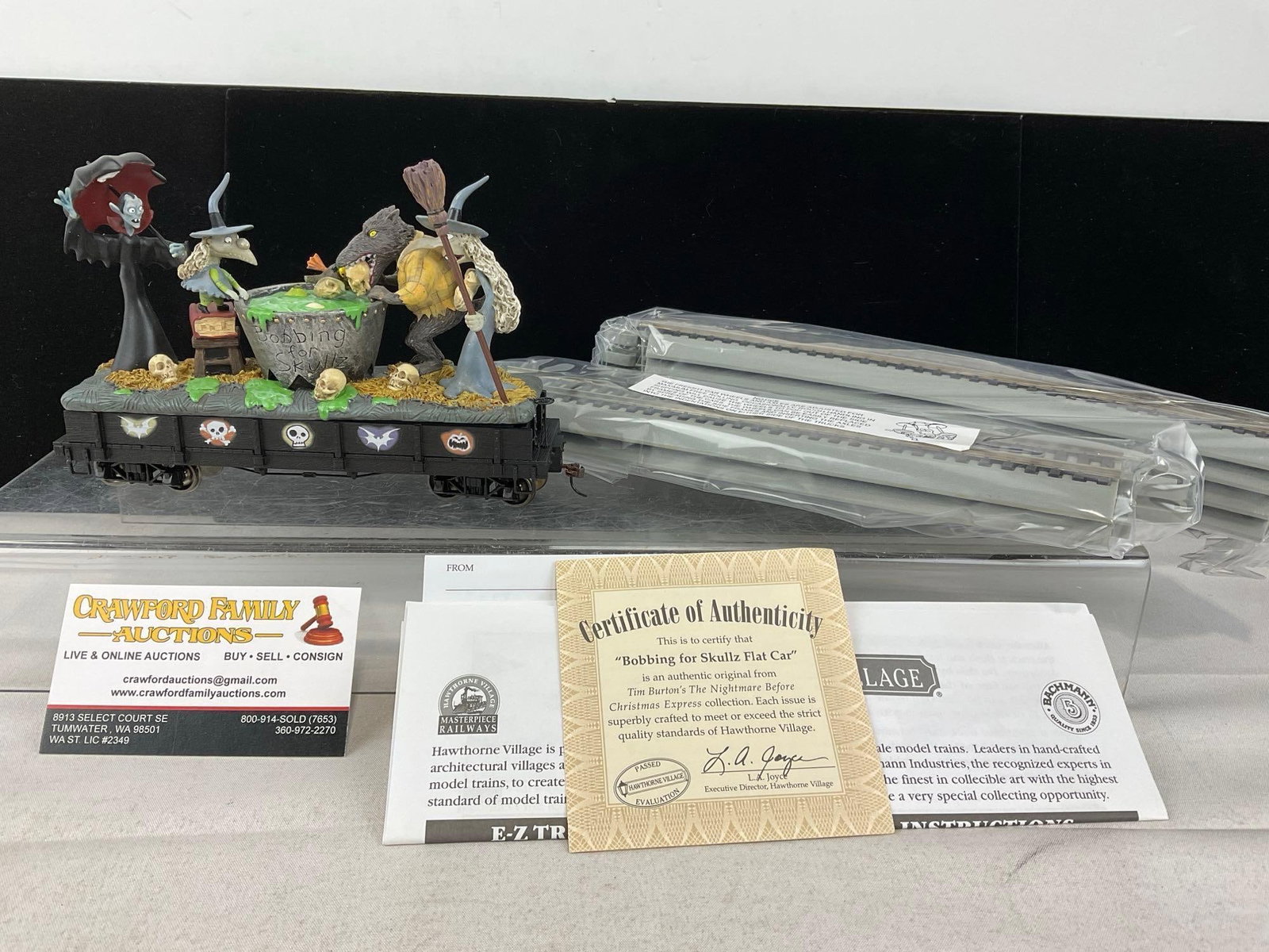Hawthorne Village Nightmare Before Christmas Train Flat Car, Bobbing for Skullz, 4th Issue, w/COA: In original foam, piece, no box though. Appears to be in good shape, electrics untested, only lightly used. The piece measures approx 8h x 19w x 15d inches. See pics. E-6160