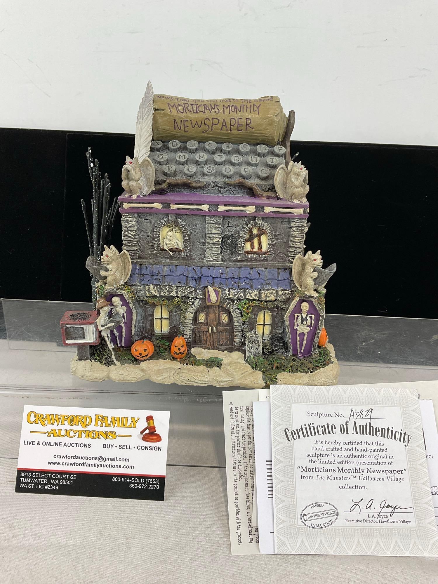 Hawthorne Village Halloween Light Up Bldg, The Munsters, Morticians Monthly Newspaper, A5829 w/COA: In original foam, piece, no box though. Appears to be in good shape, electrics untested, only lightly used. The piece measures approx 9h x 12w x 10d inches. See pics. E-6160