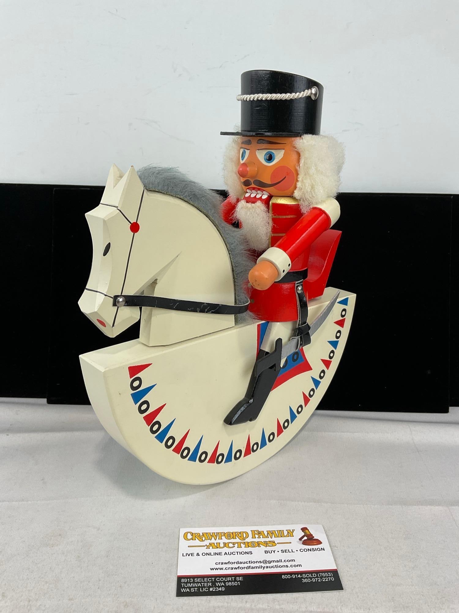 Handpainted Erzgebirge East German Nutcracker Wooden Figure, on Rocking Horse, 1989: Appears to be in good shape. The piece measures approx 12h x 10w x 4d inches. See pics. E-6160