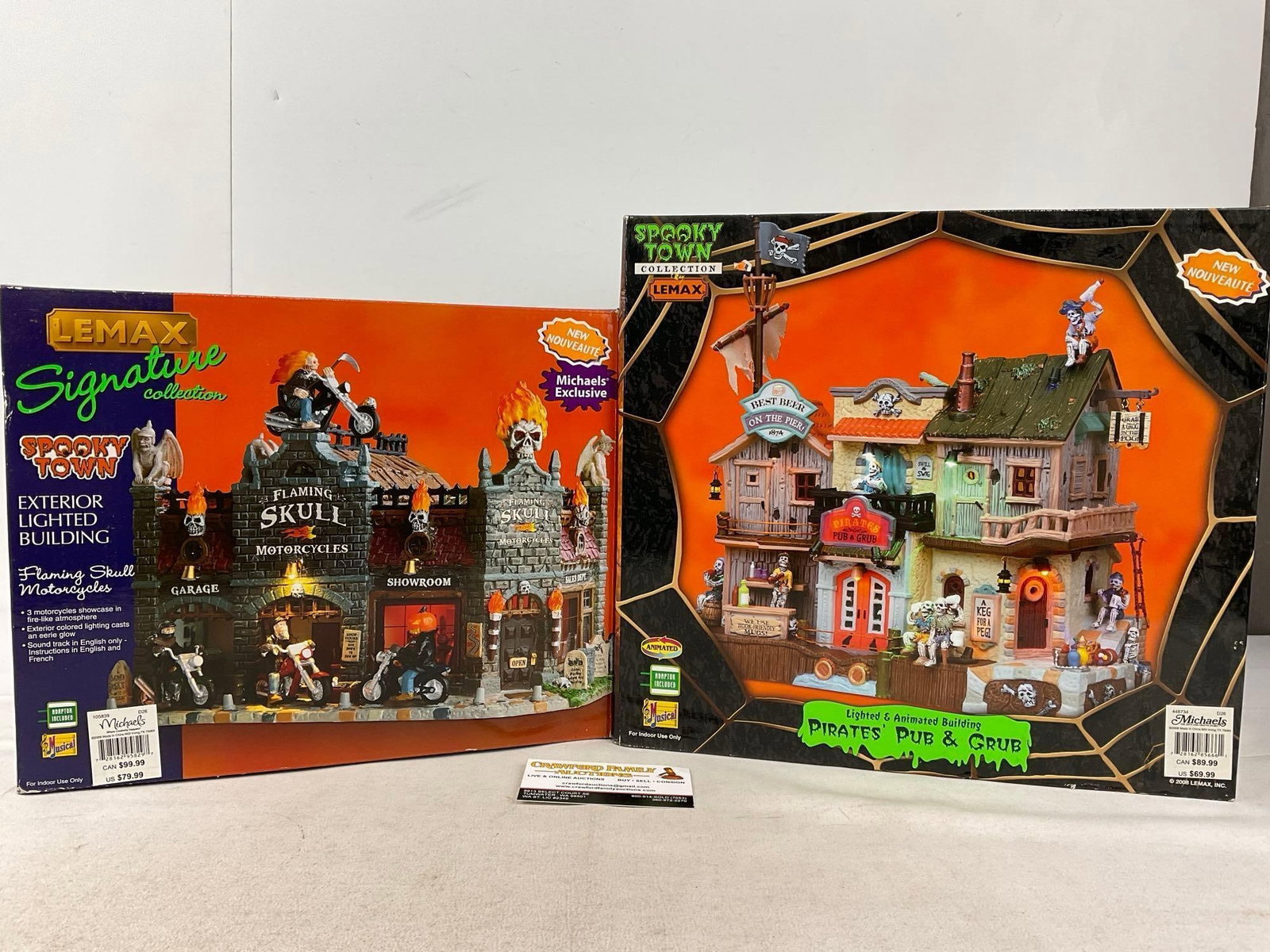 Lemax Spooky Town Figures in box, Flaming Skull Motorcycles & Pirates Pub & Grub: Appears to be in good shape, electrics untested, only lightly used. The piece measures approx 16h x 14w x 13d inches. See pics. E-6160