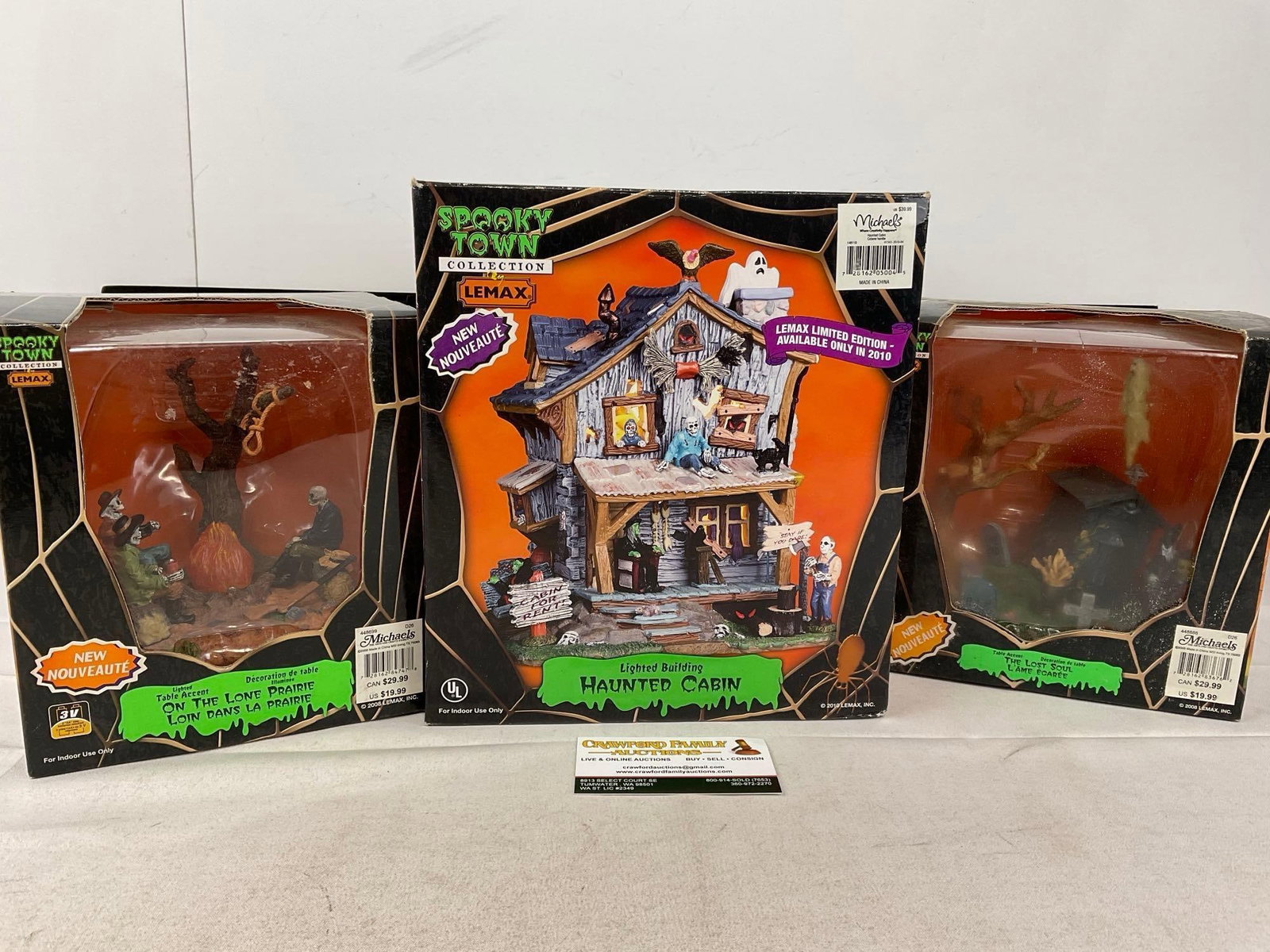 Lemax Spooky Town Figures in box, On the Lone Prairie, Haunted Cabin, & The Lost Soul: Appears to be in good shape, electrics untested, only lightly used. The piece measures approx 16h x 12w x 10d inches. See pics. E-6160
