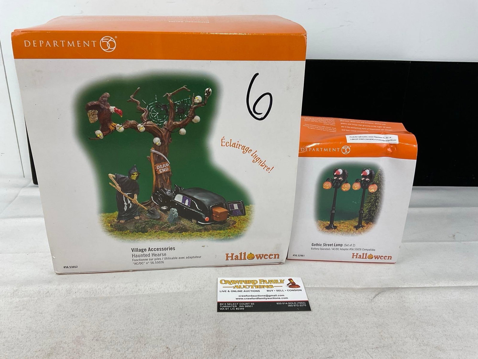 Department 56 Halloween Figures in packaging, Haunted Hearse & Gothic Street Lamps, Set of 2: Appears to be in good shape, electrics untested, only lightly used. The piece measures approx 12h x 11w x 11d inches. See pics. E-6160
