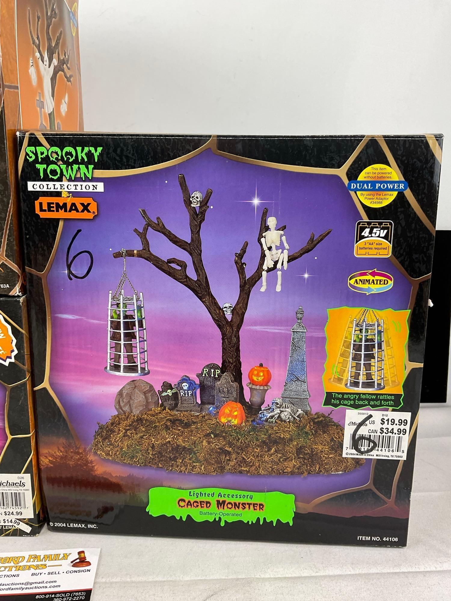 Lemax Spooky Town Halloween pieces in box, Graveyard Ghost, Grim Reaper Graveyard, & Caged Monster - 3