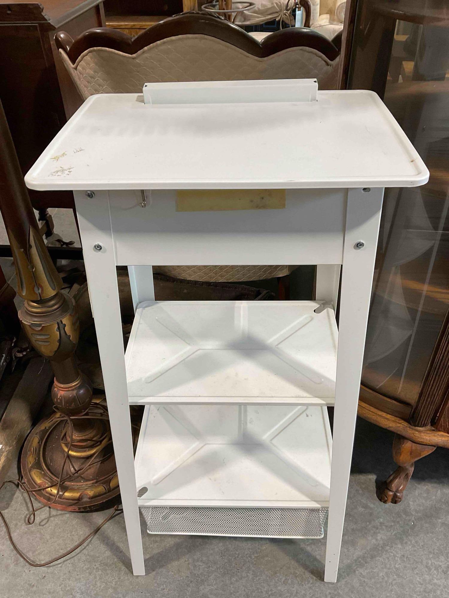 IKEA White Standing Workstation. Fair Condition. Measures 17" x 12" x 38" See pics: IKEA White Standing Workstation. Fair Condition. Measures 17" x 12" x 38" Looks to be in fair condition. DM-414 *Freight Required if shipped, Buyer Arranged/Responsibility*