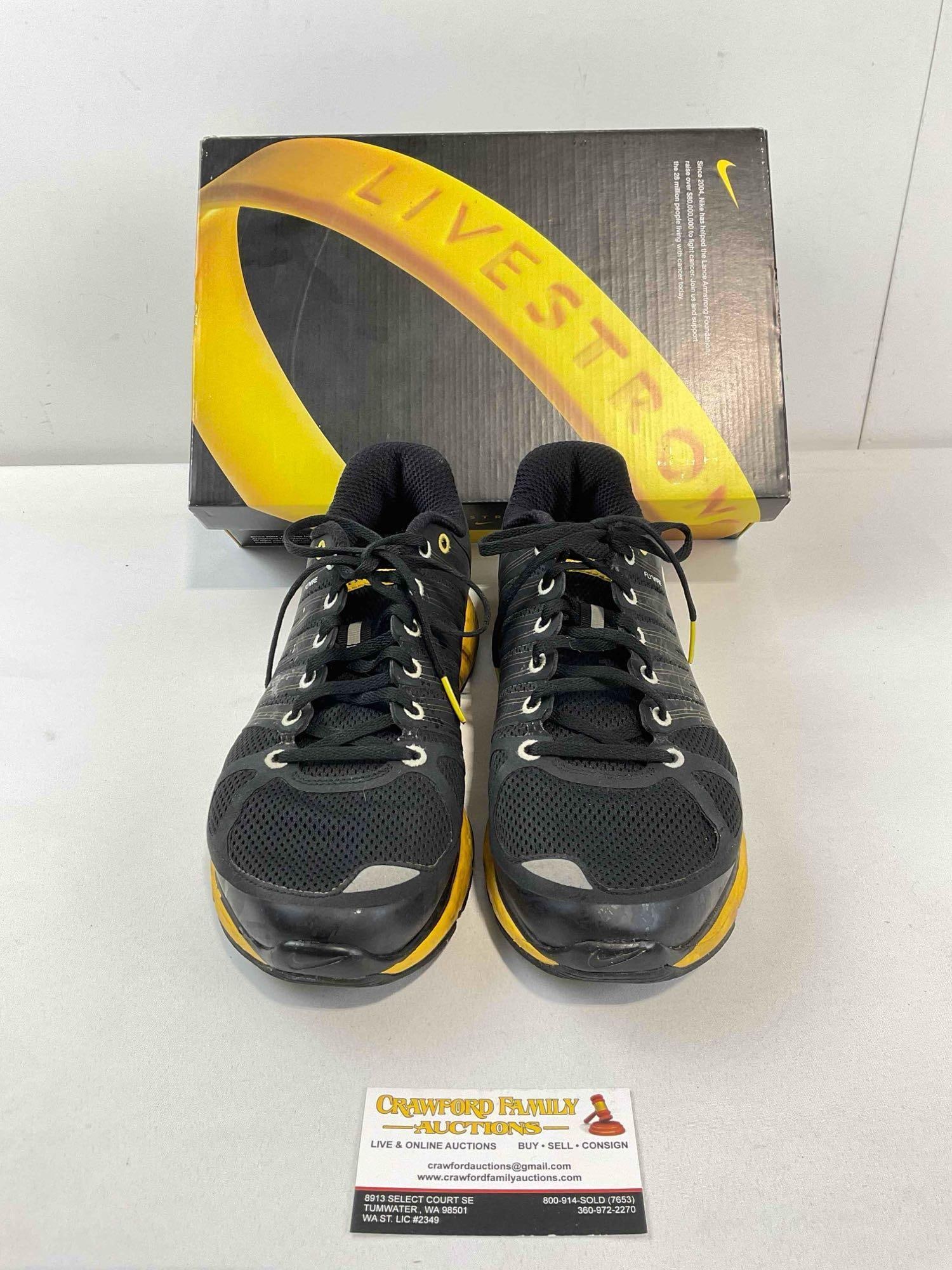 Pair of NIKE US Men's 11 Lunarlite+ 2 LAF Livestrong Black & Yellow Running Shoes w/ Box.: Pair of NIKE US Men's 11 Lunarlite+ 2 LAF Livestrong Black & Yellow Running Shoes w/ Box. have wear indicative of age and use, otherwise look to be in fair condition. Measures 14" x 9" x 5" DM-414