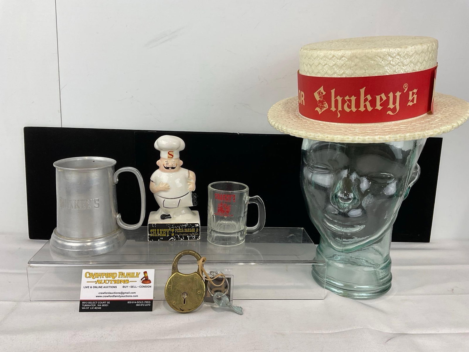 Vintage Shakeys Pizza Stein, Coin Bank, Tiny Mug, & Foam Hat, + Lori Corp Lock w/Key: Appears to be in good shape. The piece measures approx 9h x 13w x 13d inches. See pics. E-6120