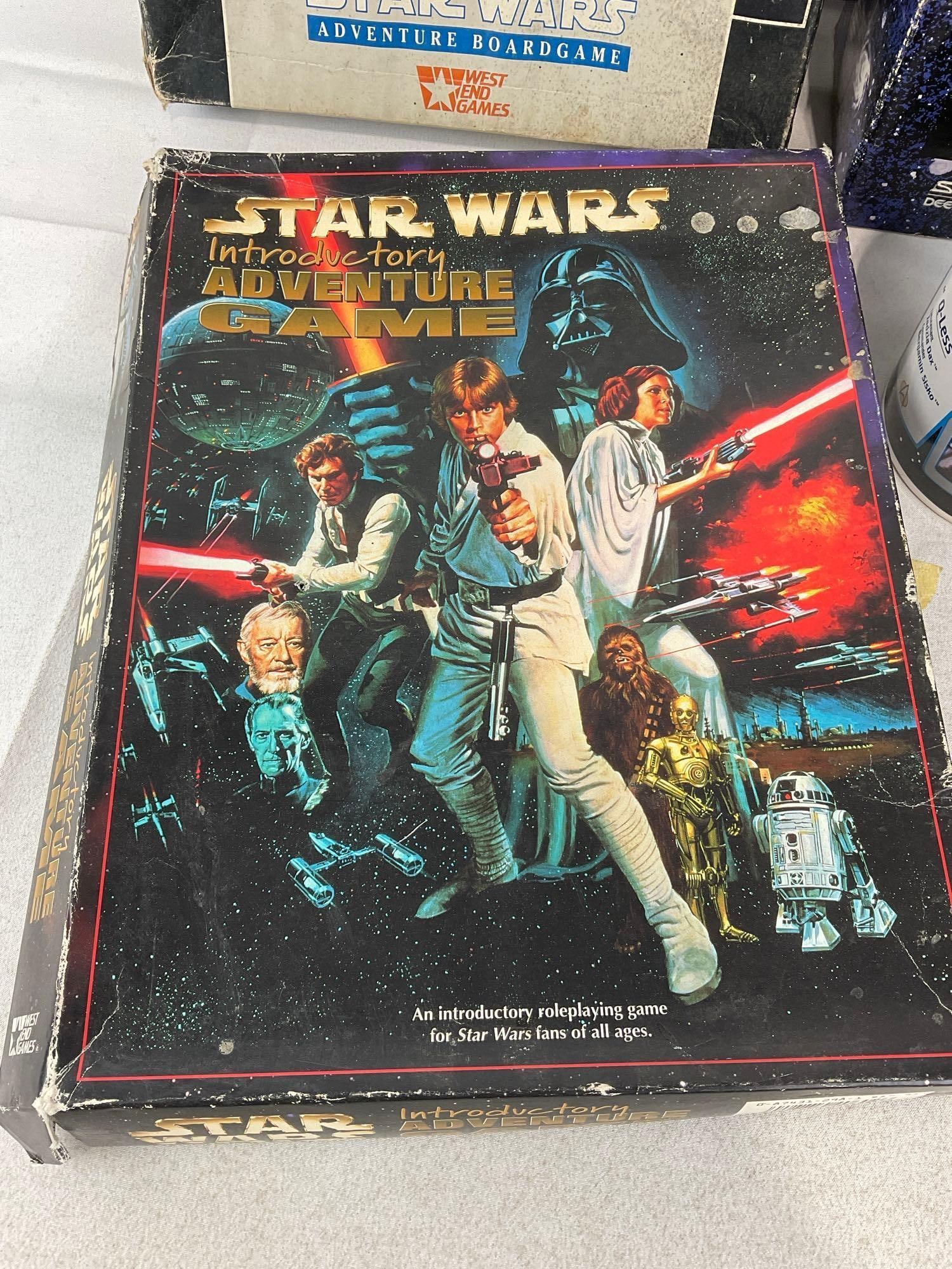 Pair of Star Wars Adventure Board Games, Pair of Star Trek DS9 Mugs in box, & 2019 Lightsaber Toy - 2