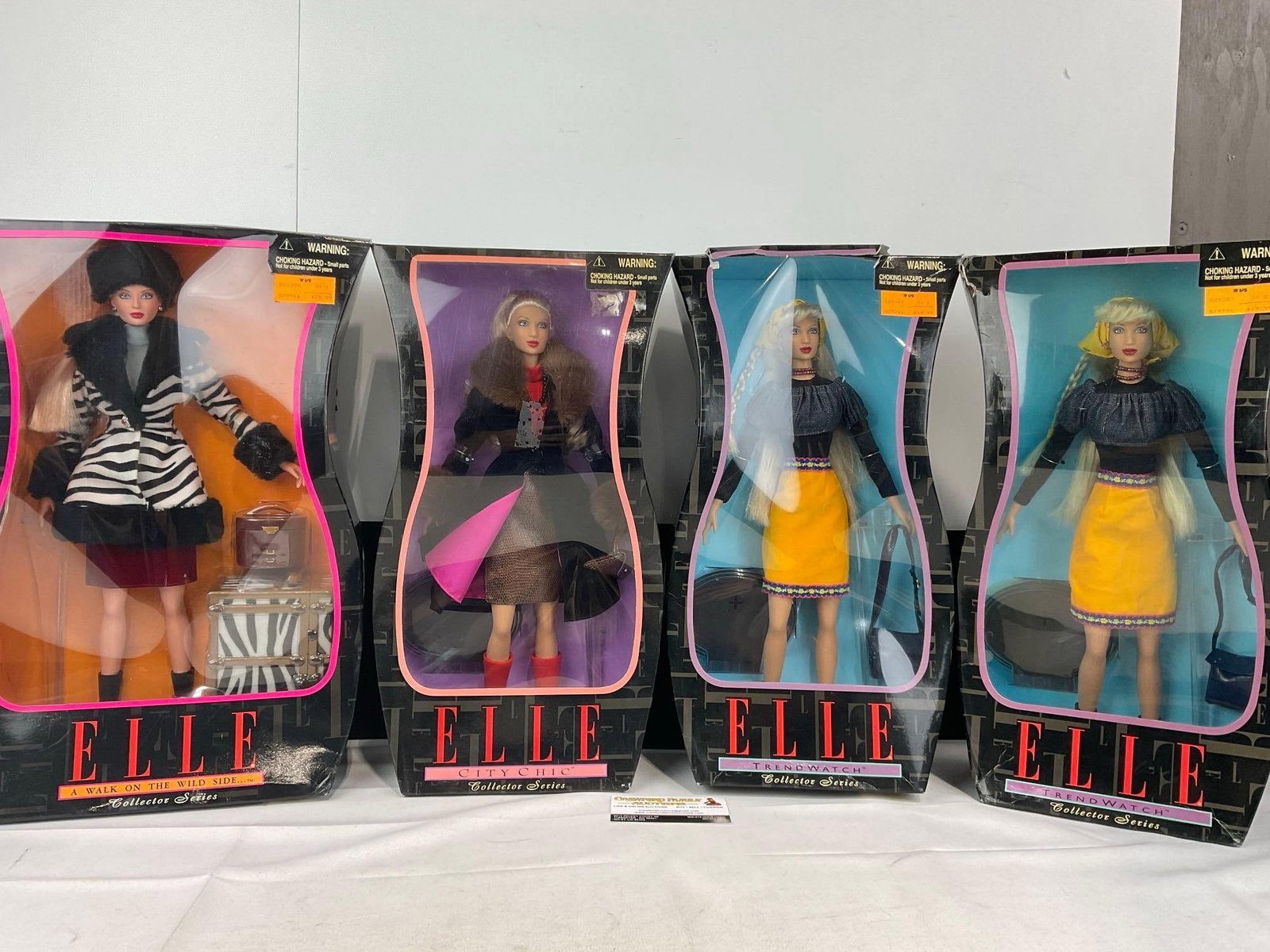 Set of 4 ELLE Fashion Dolls in box, A Walk on the Wild Side, City Chic & 2x Trendwatch: Appears to be in good shape. The piece measures approx 18h x 22w x 10d inches. See pics. E-6160